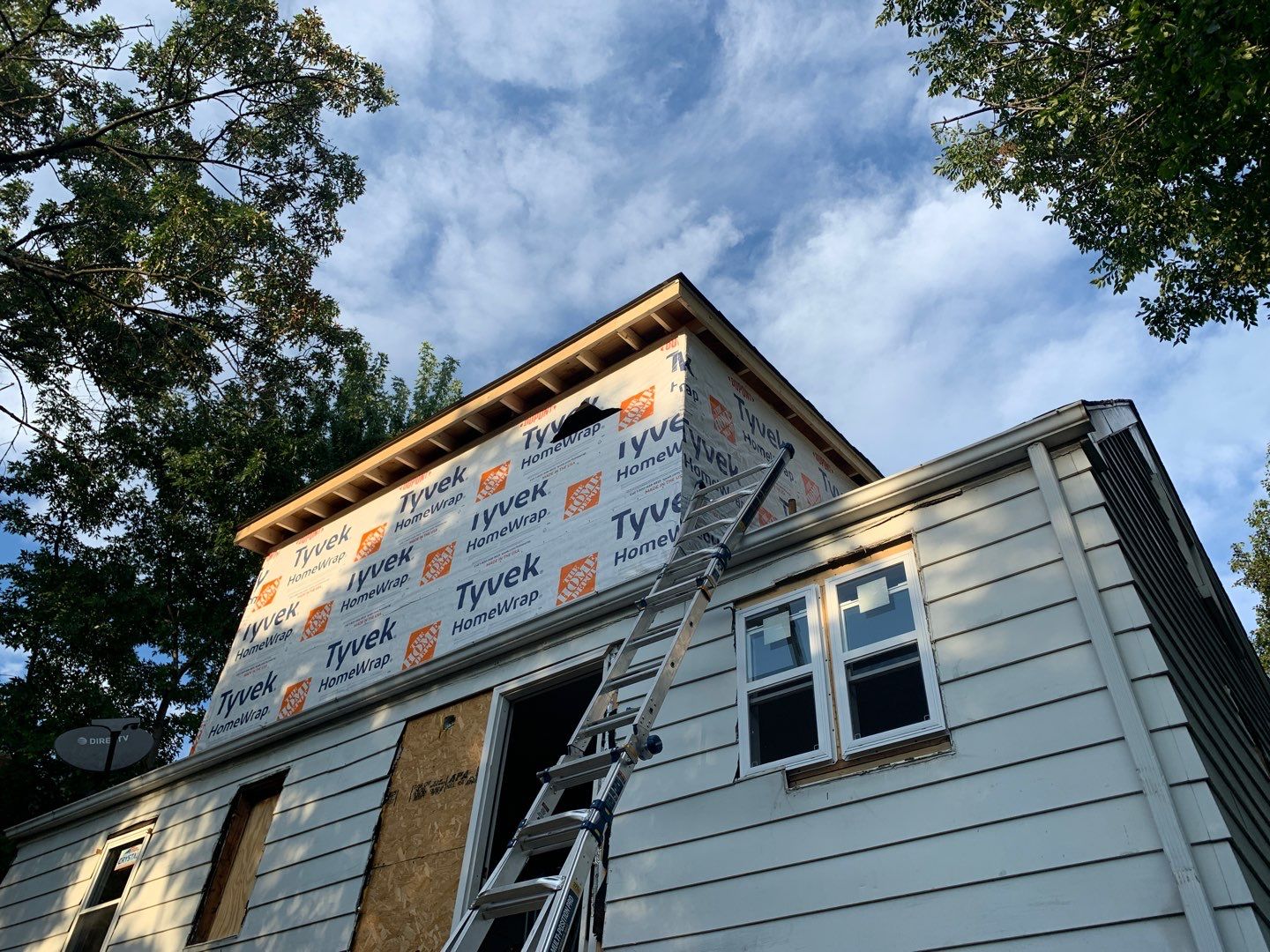 Room addition on the second floor of house by Greenspring Construction Services