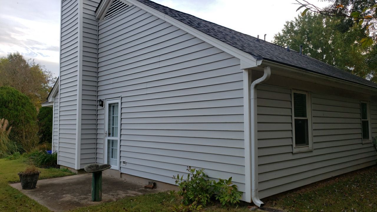House Wash using cleaner  by Power Wash Masters LLC