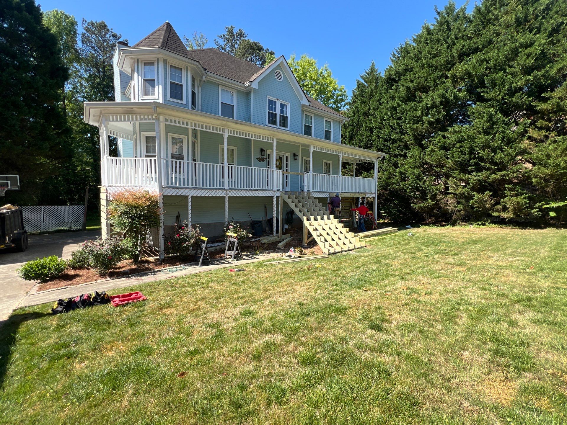 Marietta Porch Upgrade with Horizontal Pressure-Treated Wood Slats by Swift Home Renovations