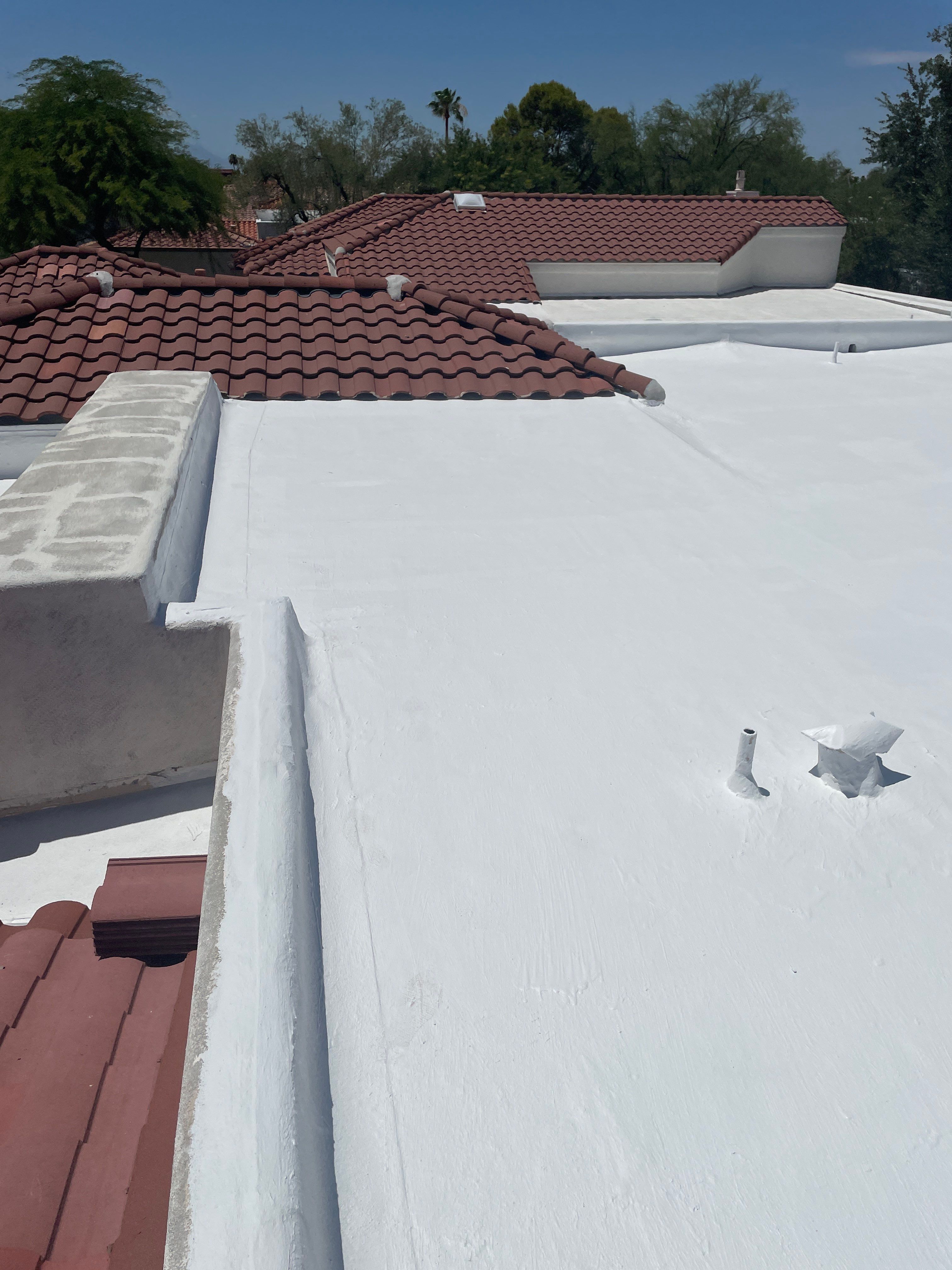 Tucson Residential Roof Restoration with Tile and Elastomeric Coating by West Coast Roofing AZ