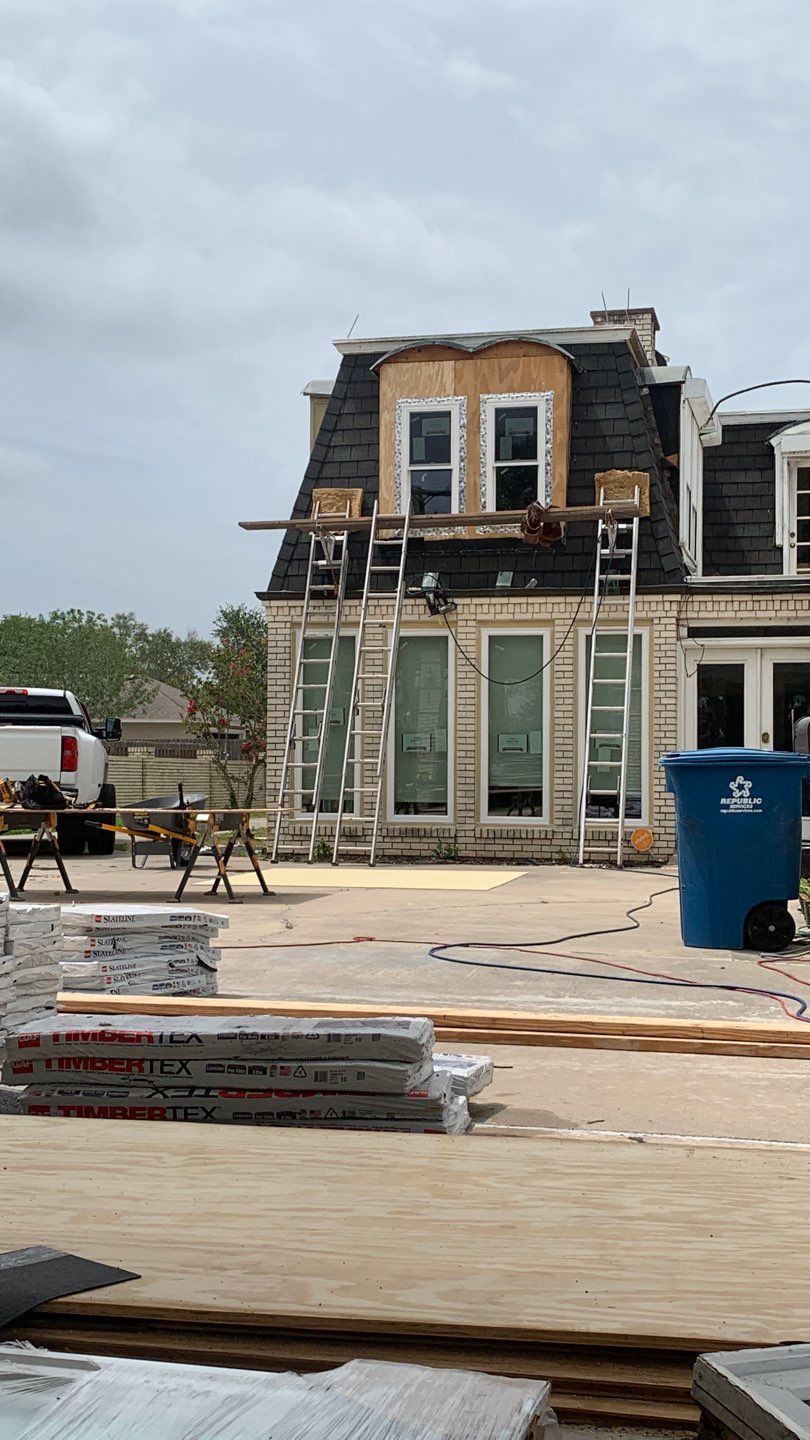 Mansard Charm by Bayfront Roofing and Construction