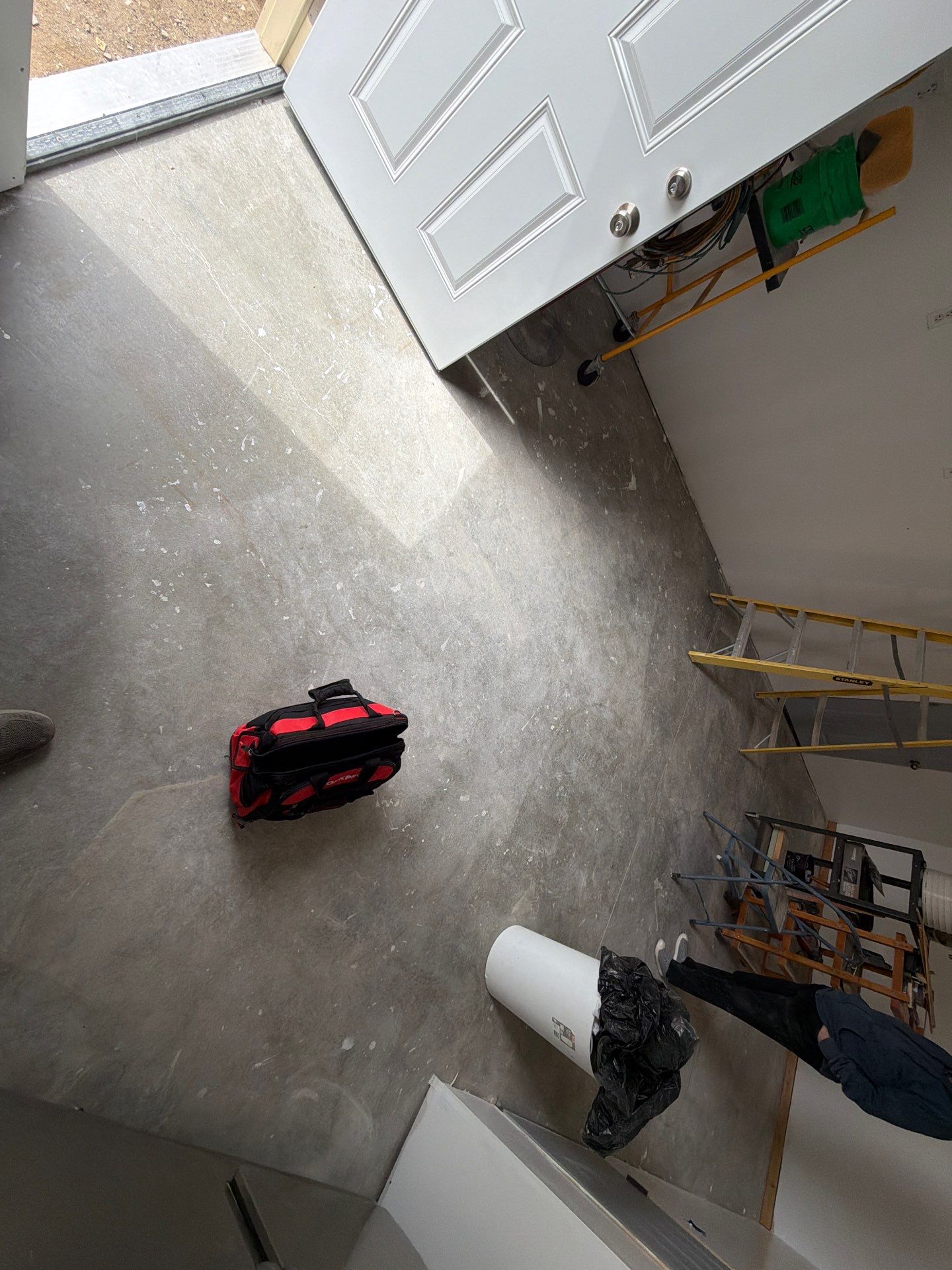 Decorative Chip Concrete Coating Installation in Luverne by Select Painting, Coatings & Garage Cabinets