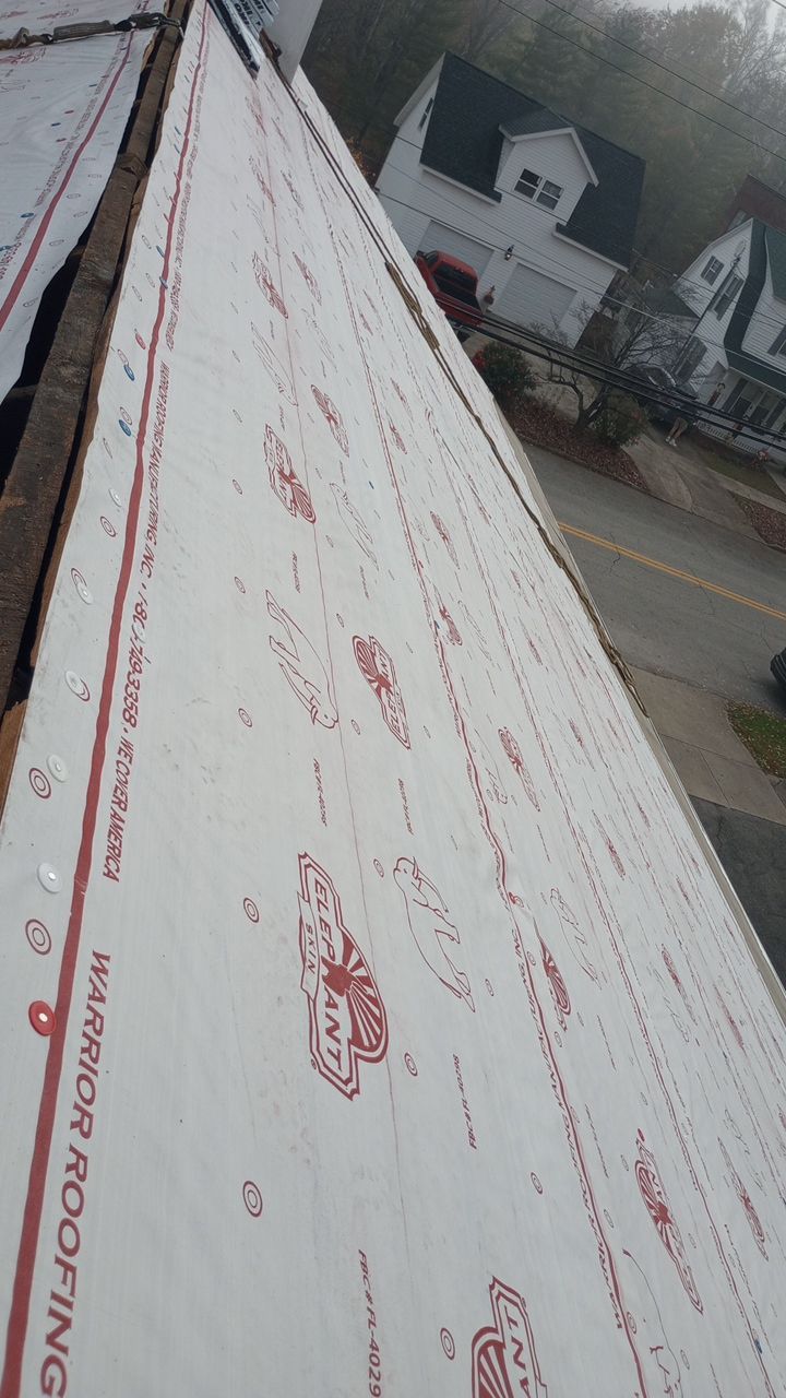 Commercial Roofing Installation using Performance Shingles by Mr. Roofer