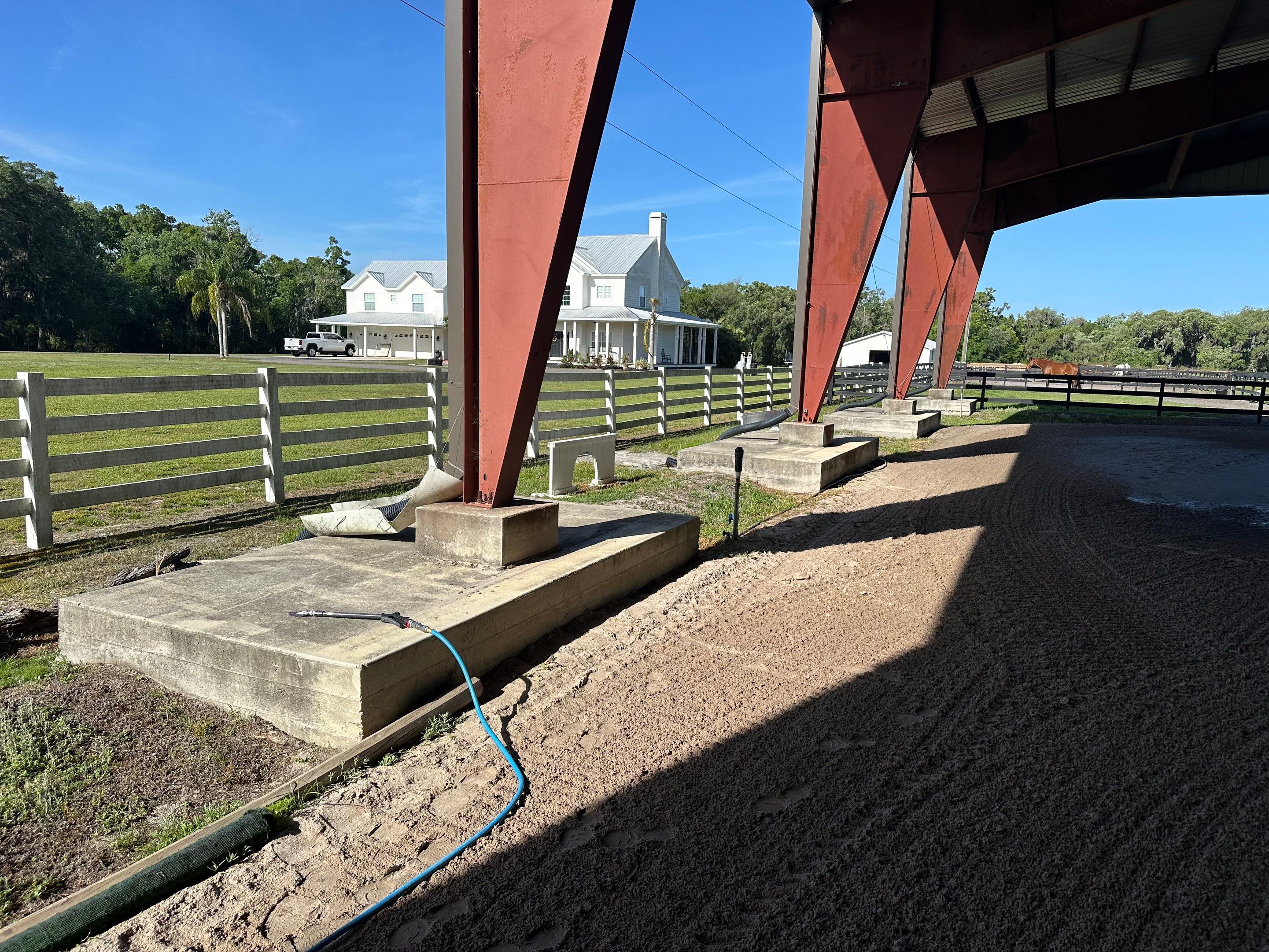 Vinyl Horse Fence & Concrete Pier Cleaning at Lesley Cox Equestrian, Parrish, FL | Sunshine AquaWash by Sunshine AquaWash