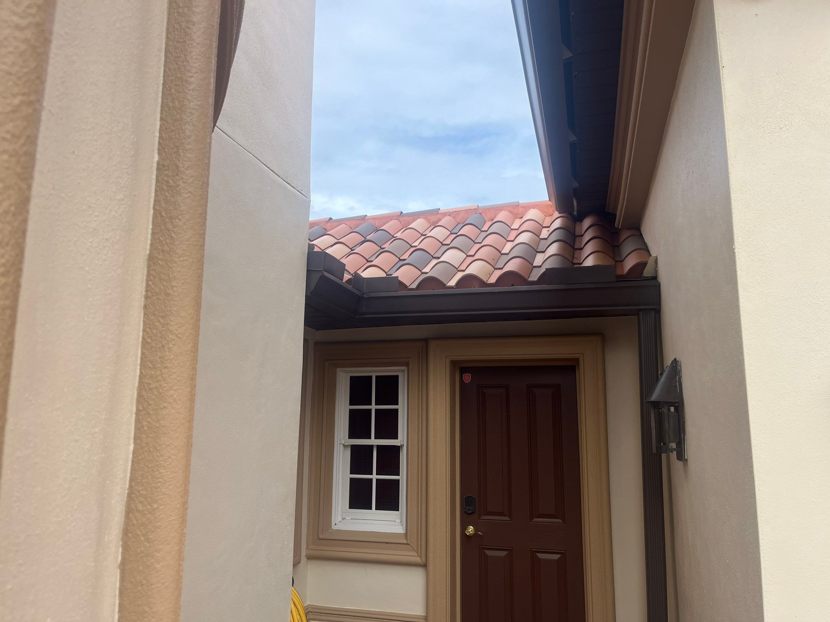 Musket Brown Seamless Gutters using Musket Brown Seamless Gutters in Cape Coral FL by Gutter Professors