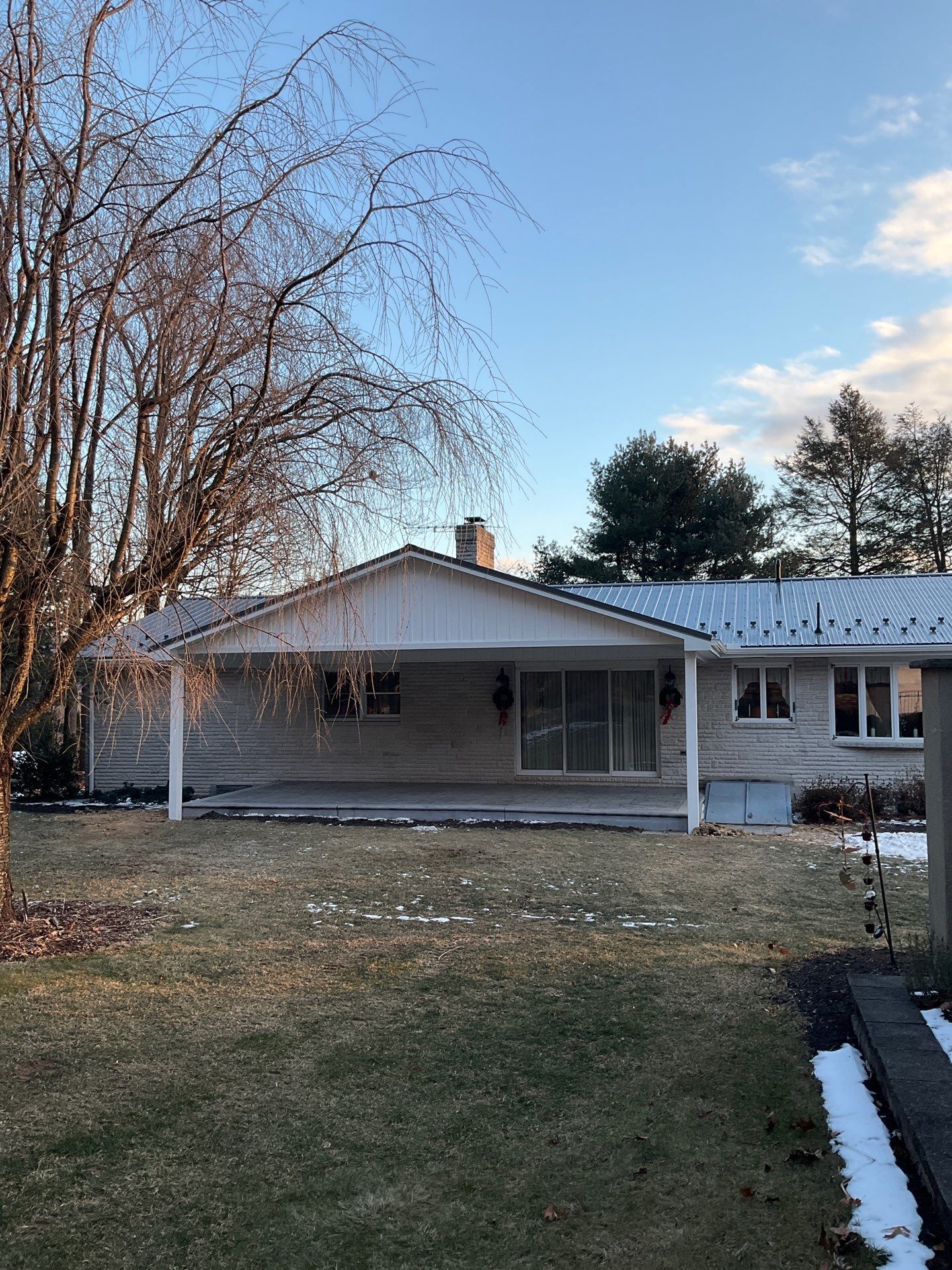 Metal Roof and Gabled Porch Addition in Hegins by Esh Builders