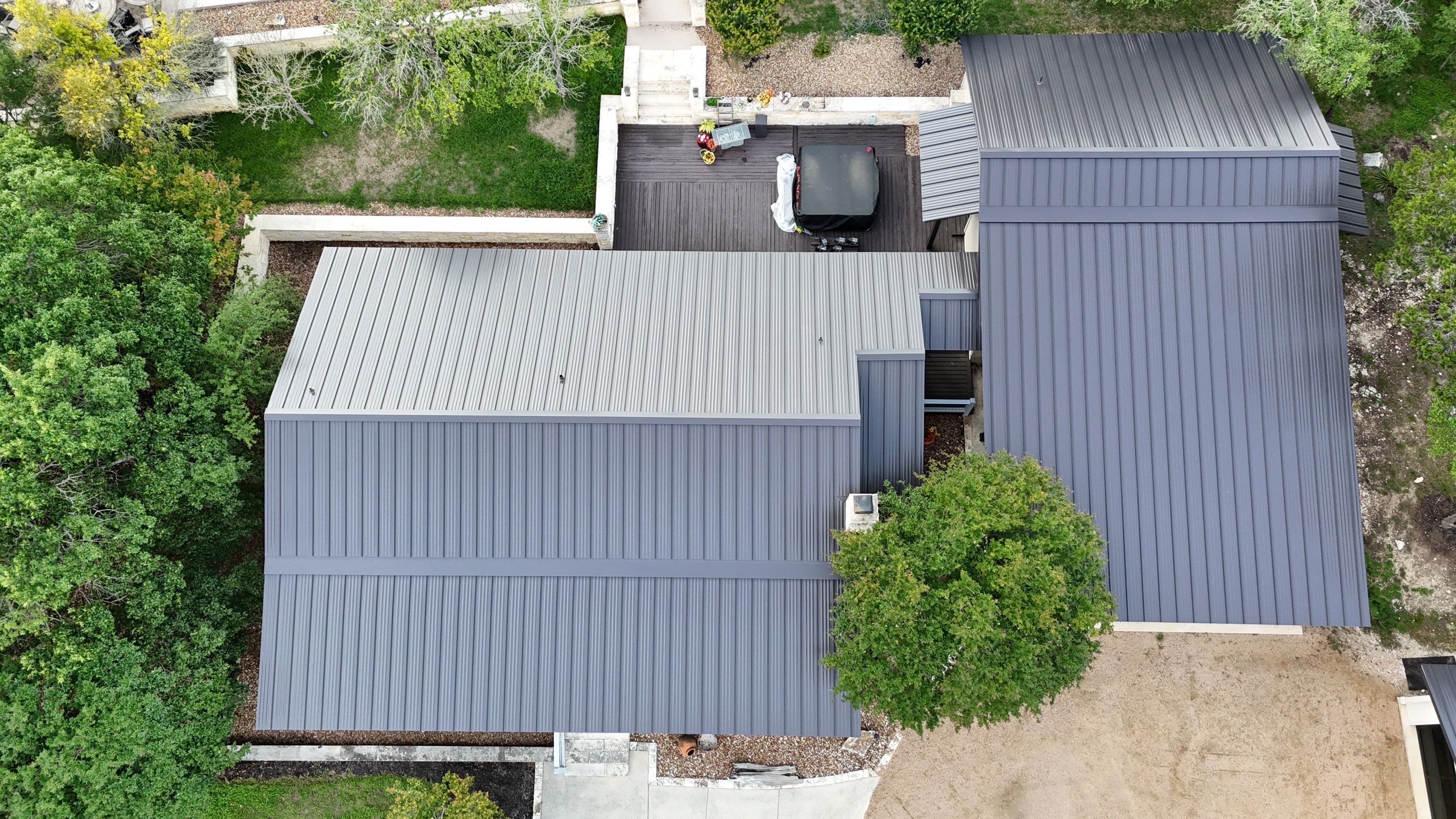 Dark Bronze Fully Striated panel by Wimberley Roofing