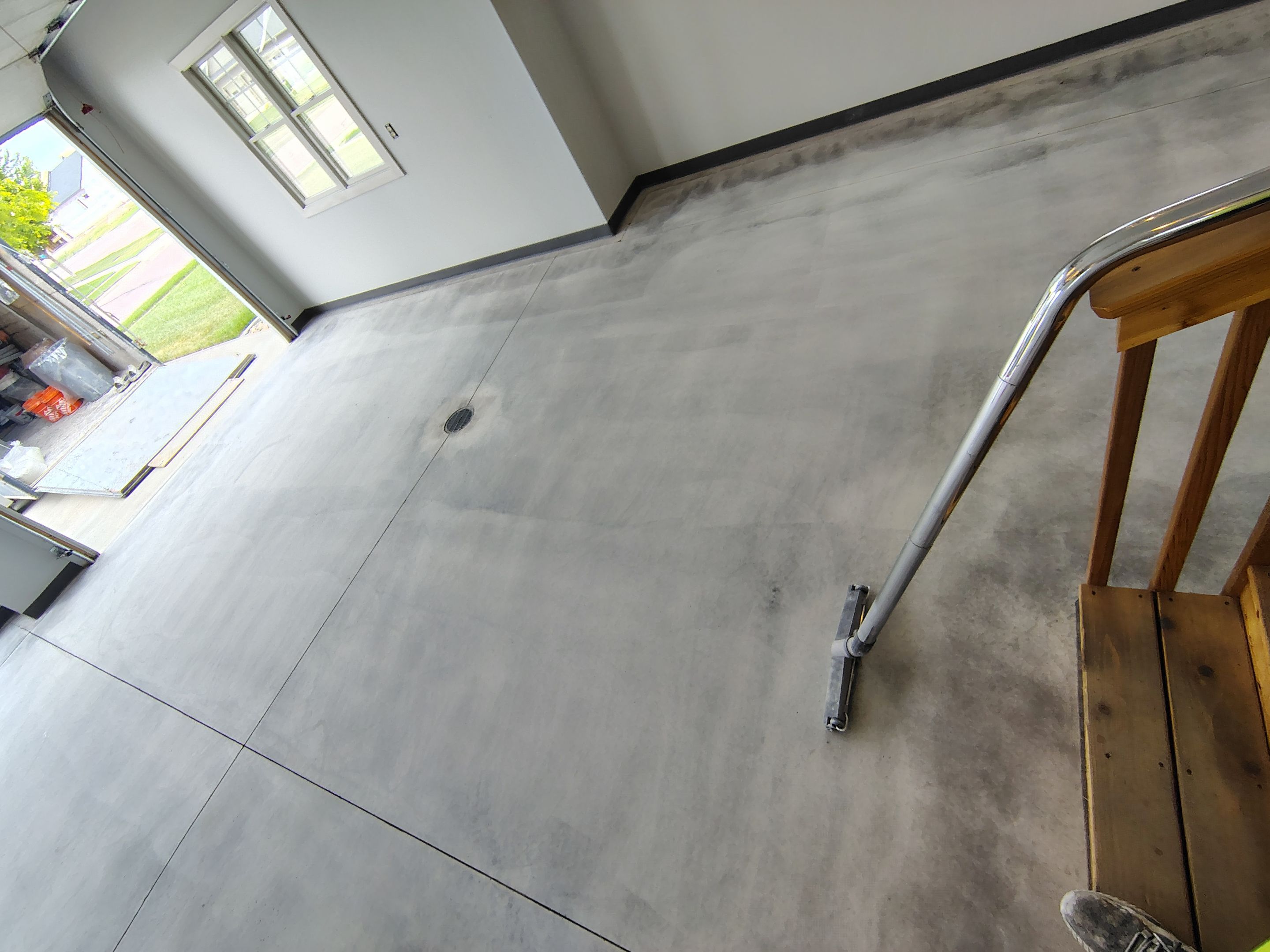 Multi-Car Garage Concrete Coating and Crack Repair in Dell Rapids by Select Painting, Coatings & Garage Cabinets