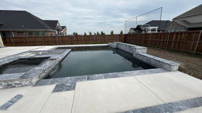 Geometric Pool with Raised Spa and Scupper Water Features