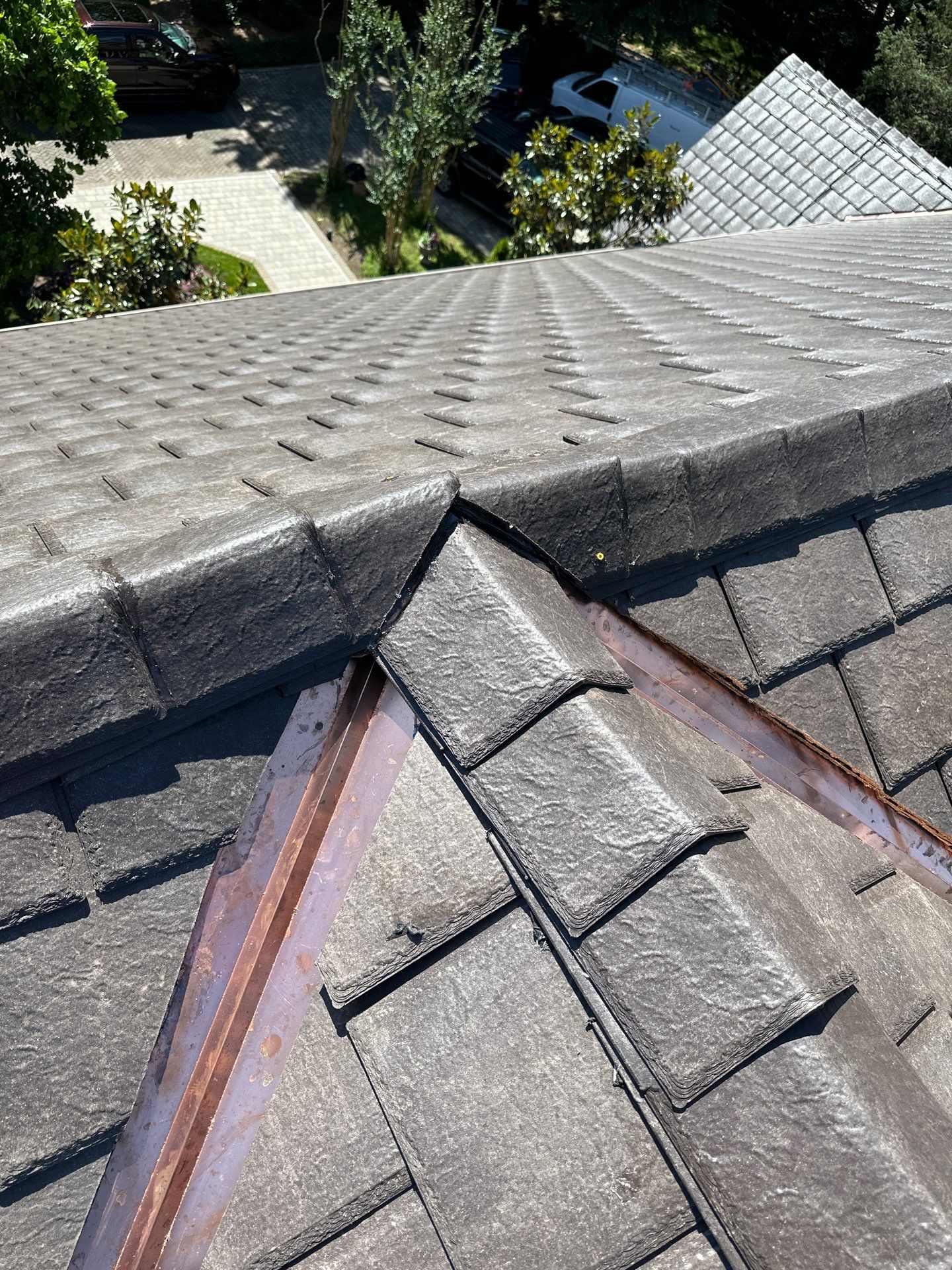Residential Roofing Installation Using Enviroshake Synthetic Slate by Undersun Roofing 