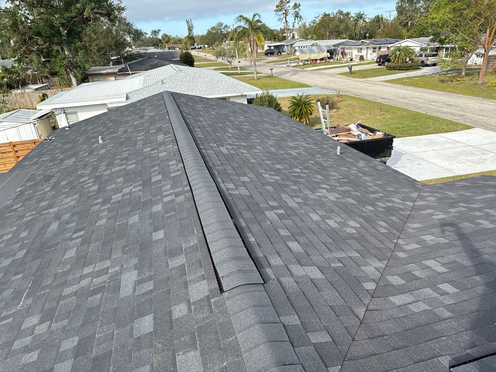 Onyx Black Shingles by Reimagine Roofing
