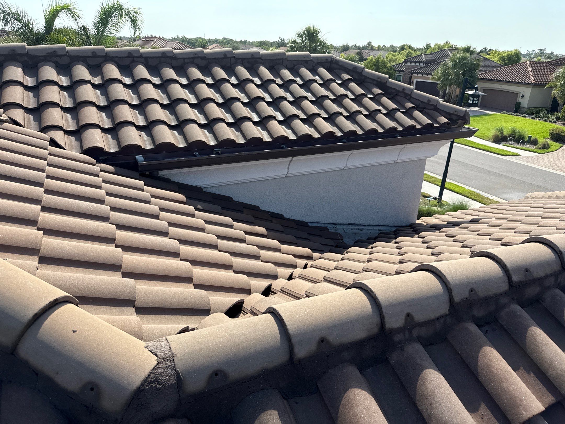 Soft Wash Roof Cleaning – Concrete Tile Roof | Artisan Lakes Esplanade, Palmetto, FL by Sunshine AquaWash