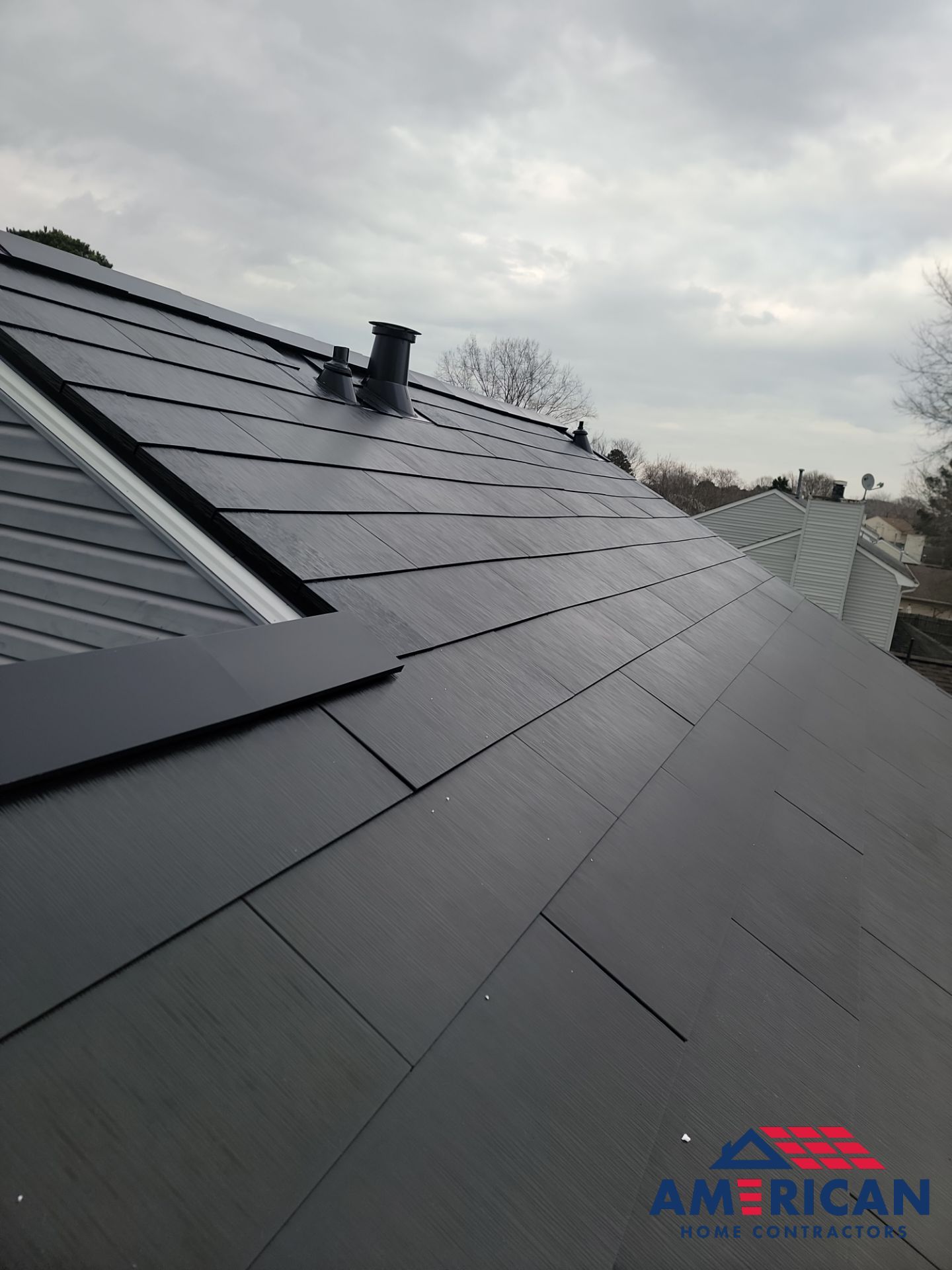 Tesla Solar Roof + Powerwall in Virginia Beach, VA by American Home Contractors