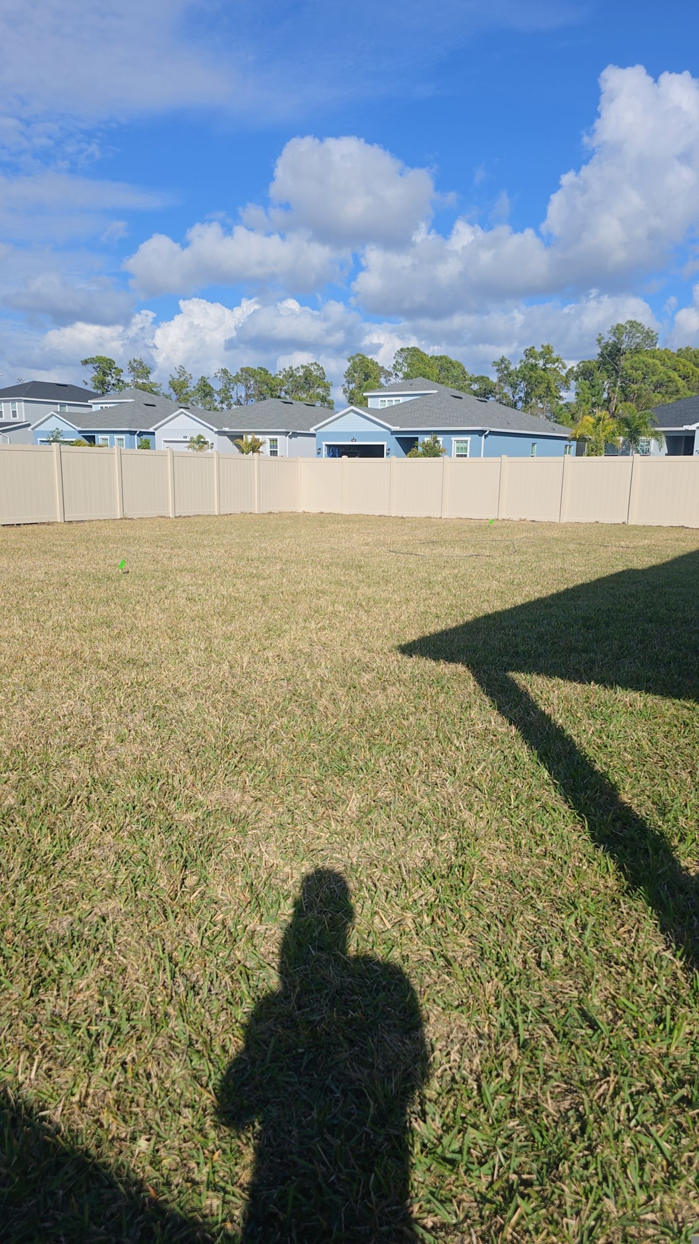 Tan Vinyl Fence in West Port by True Fence LLC