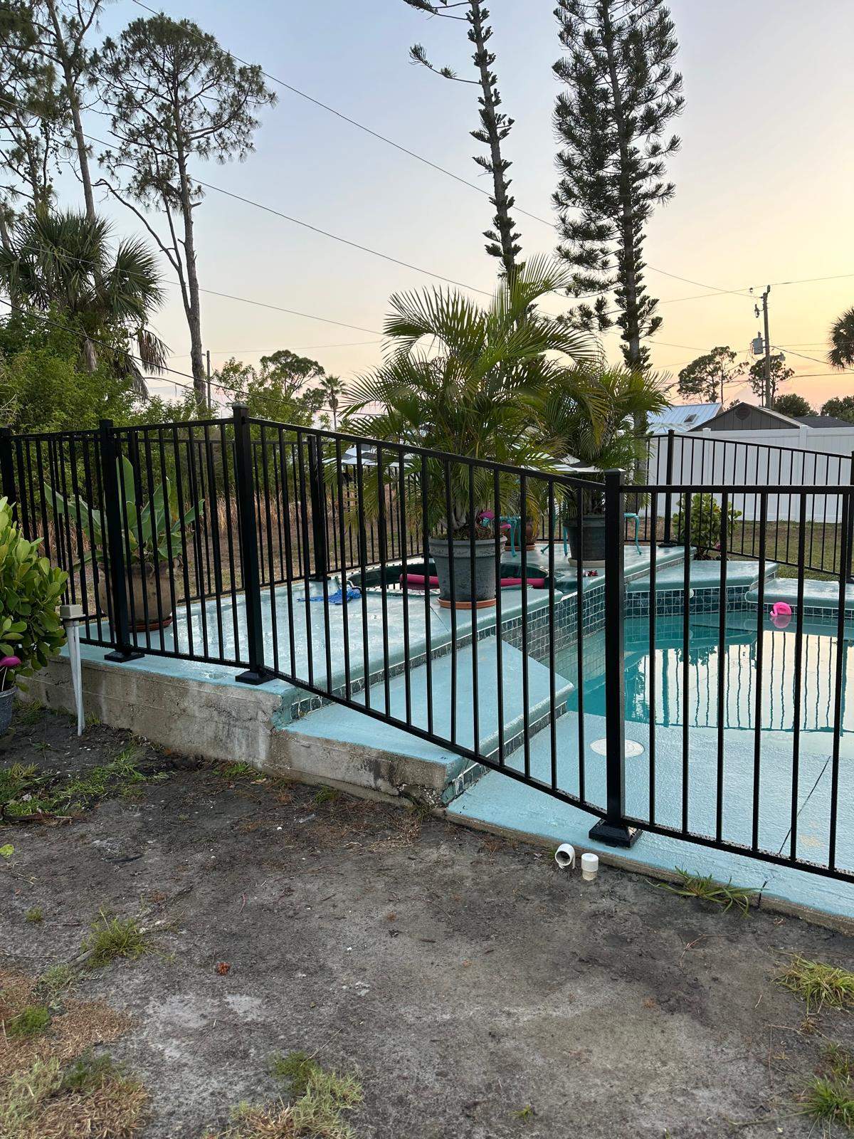 Black Aluminum Pool Fence Installation in Port Charlotte by True Fence LLC