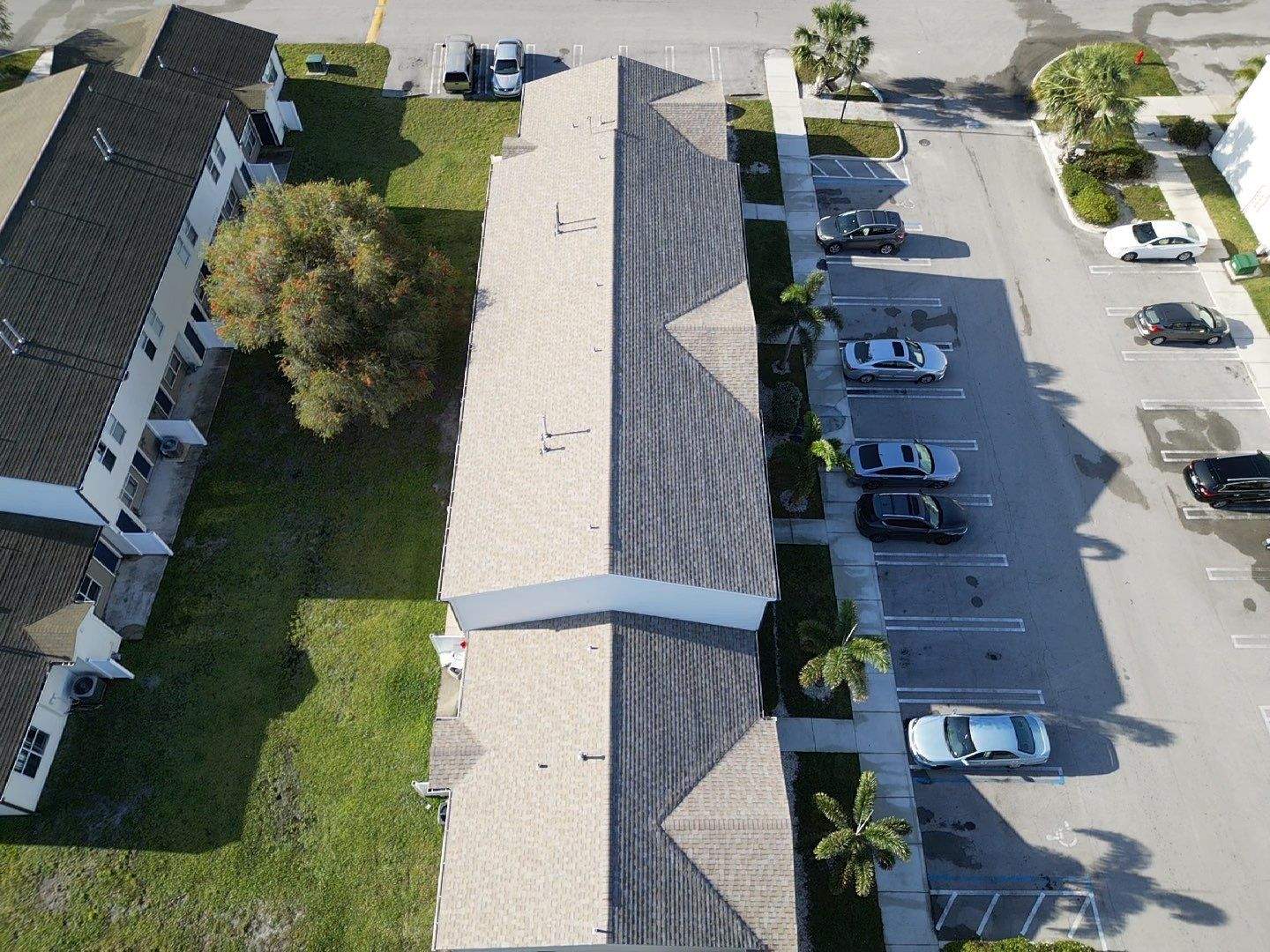 Apartment Complex Shingle Roof Replacement by Sailfish Roofing