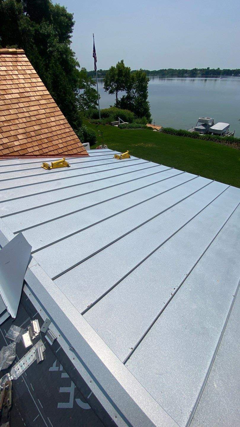 Cedar Shake Roof Replacement with Half Round Gutter Installation by Custom Installations