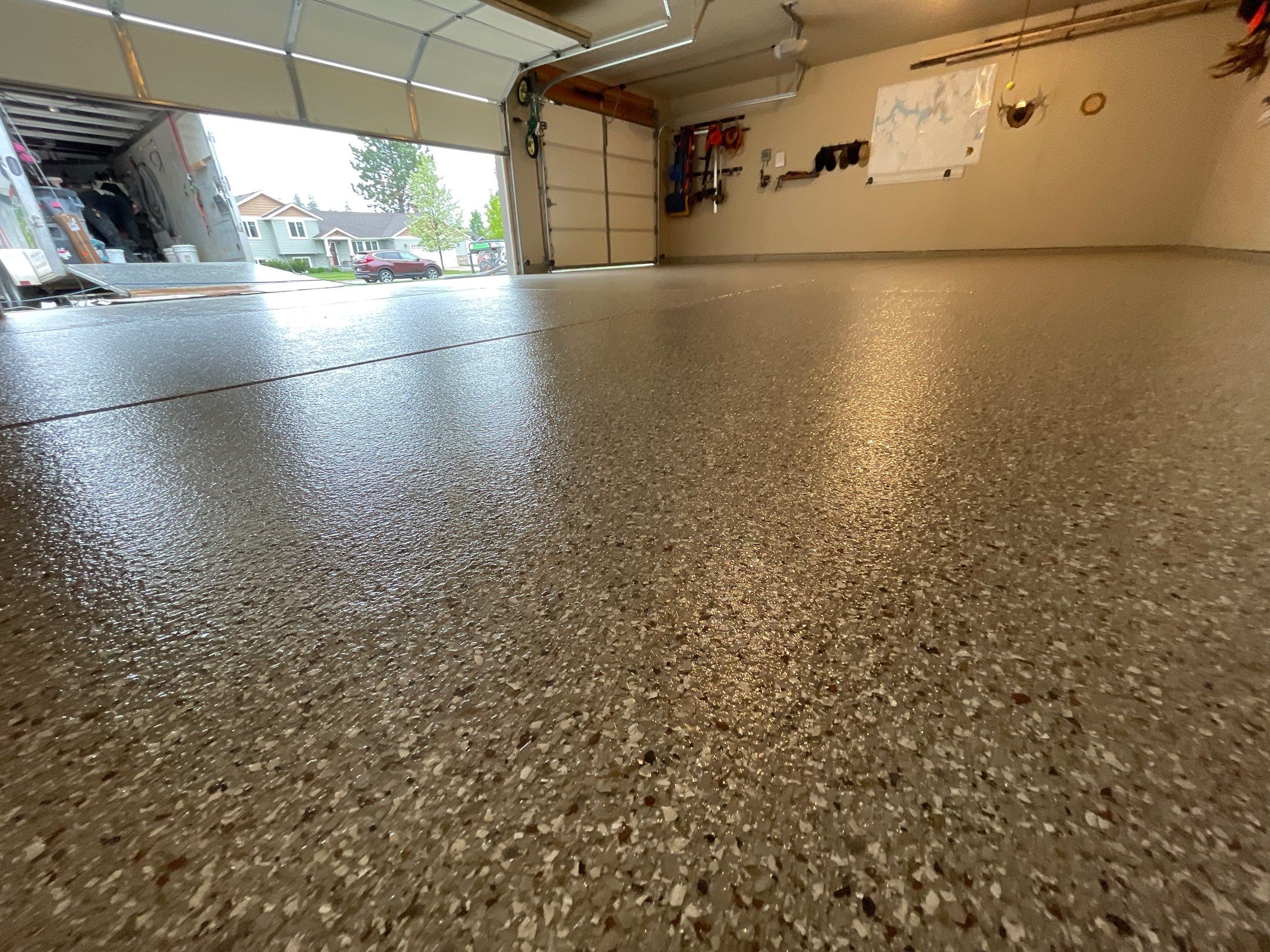 Garage Transformation using Pebble Beach and Front Porch using Greystone by Croc Coatings, LLC