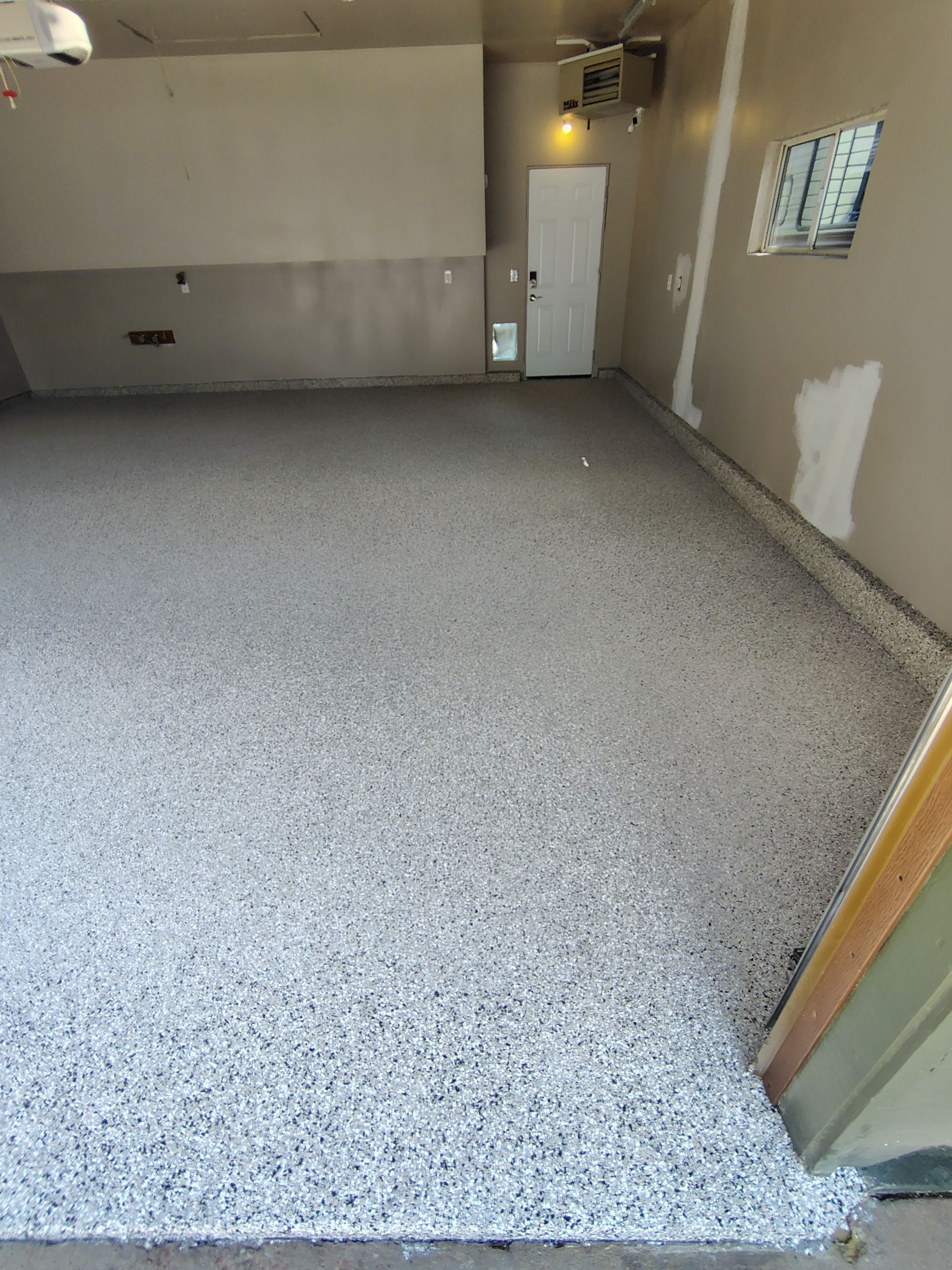 Garage Floor Coating with Decorative Flakes in Tea by Select Painting, Coatings & Garage Cabinets