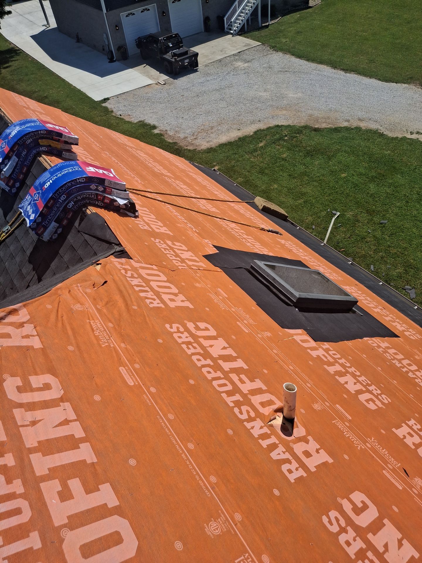 Residential Roofing Installation using GAF Timberline HDZ Charcoal by Rainstoppers Roofing