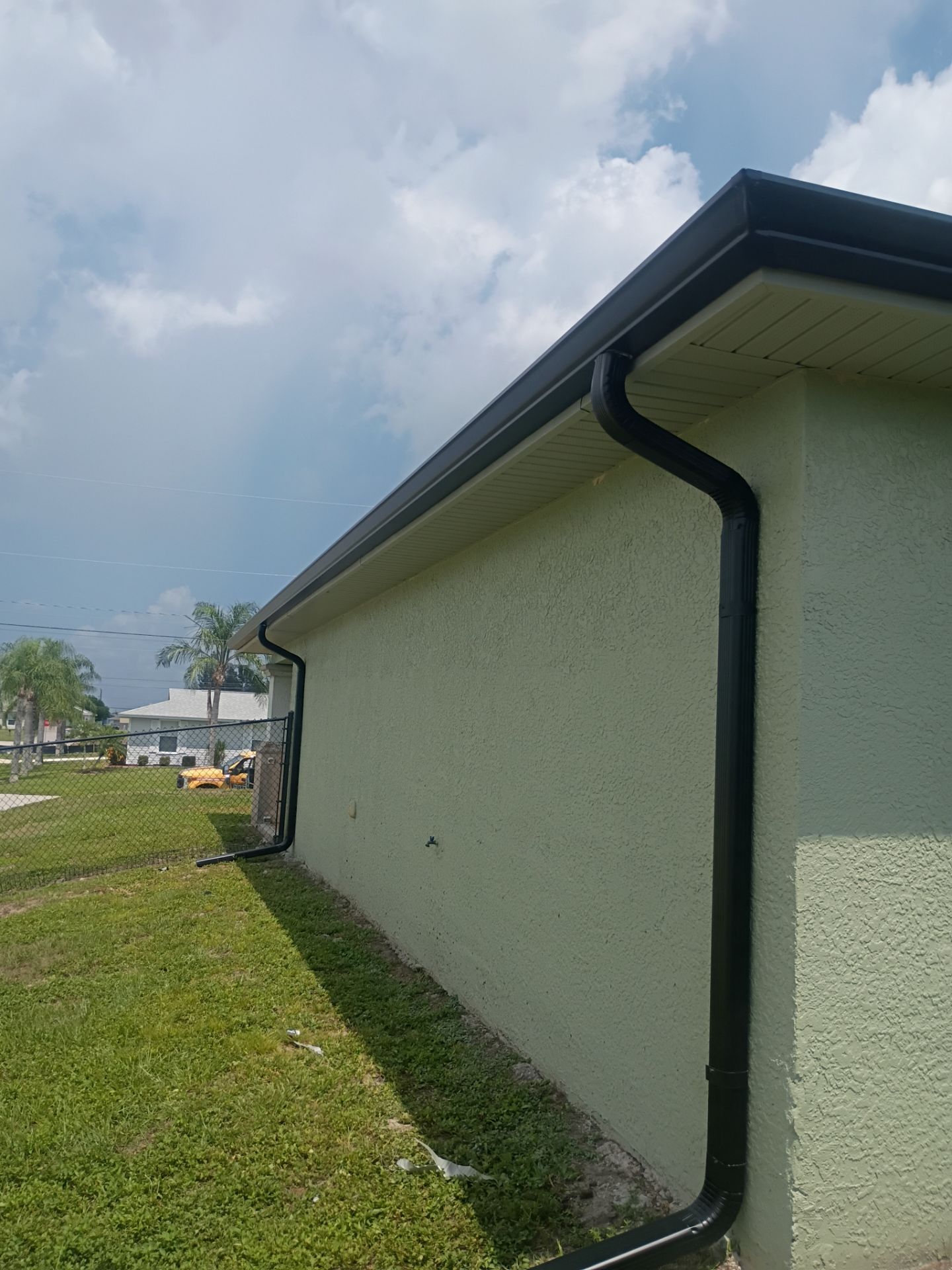 Black Seamless Gutters using K-Style Seamless Gutters in Cape Coral FL by Gutter Professors