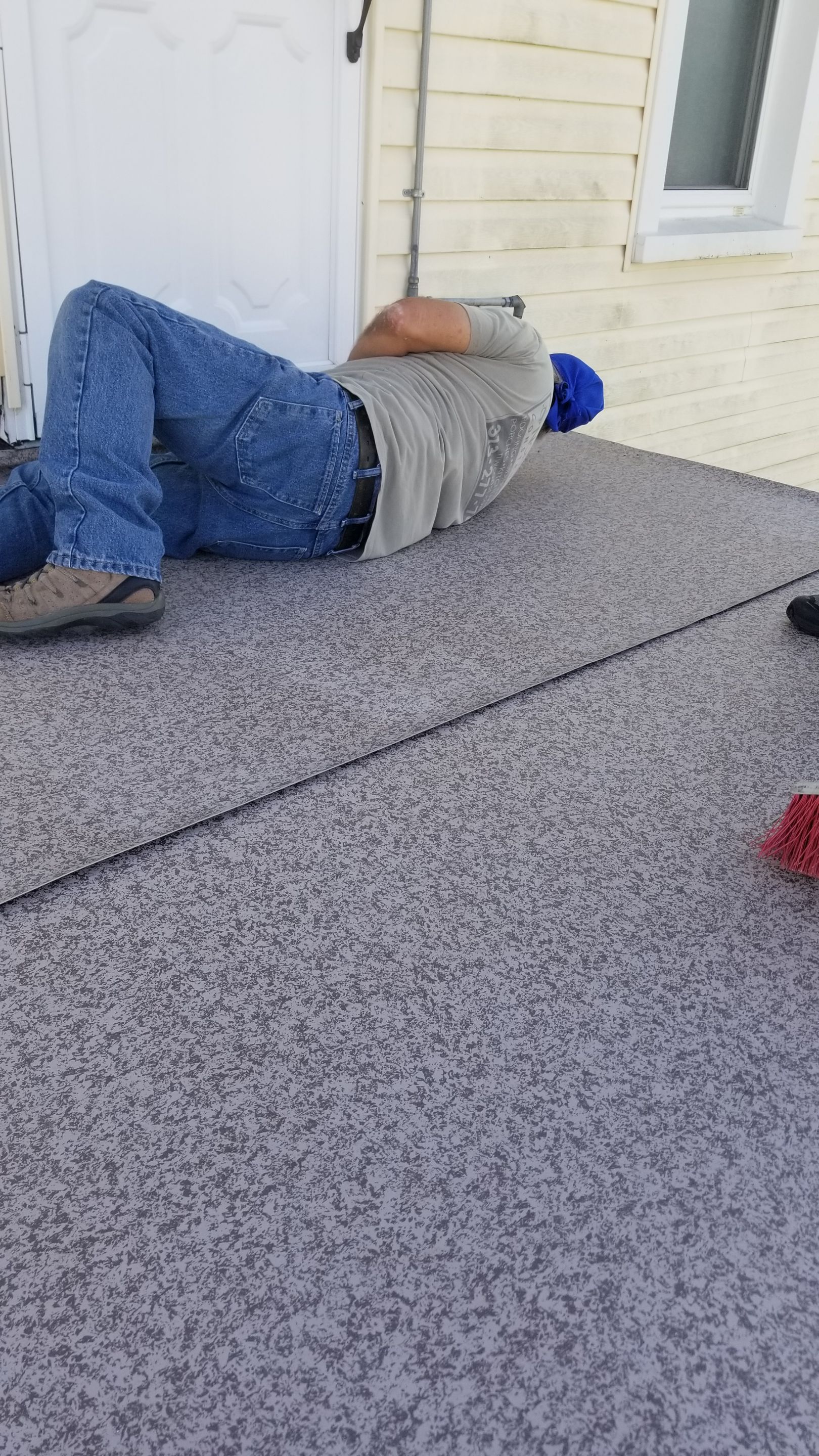 Rebuild balcony flat roofing TREX decking stairway and Railings in Wyandotte, MI by Northwest Construction 