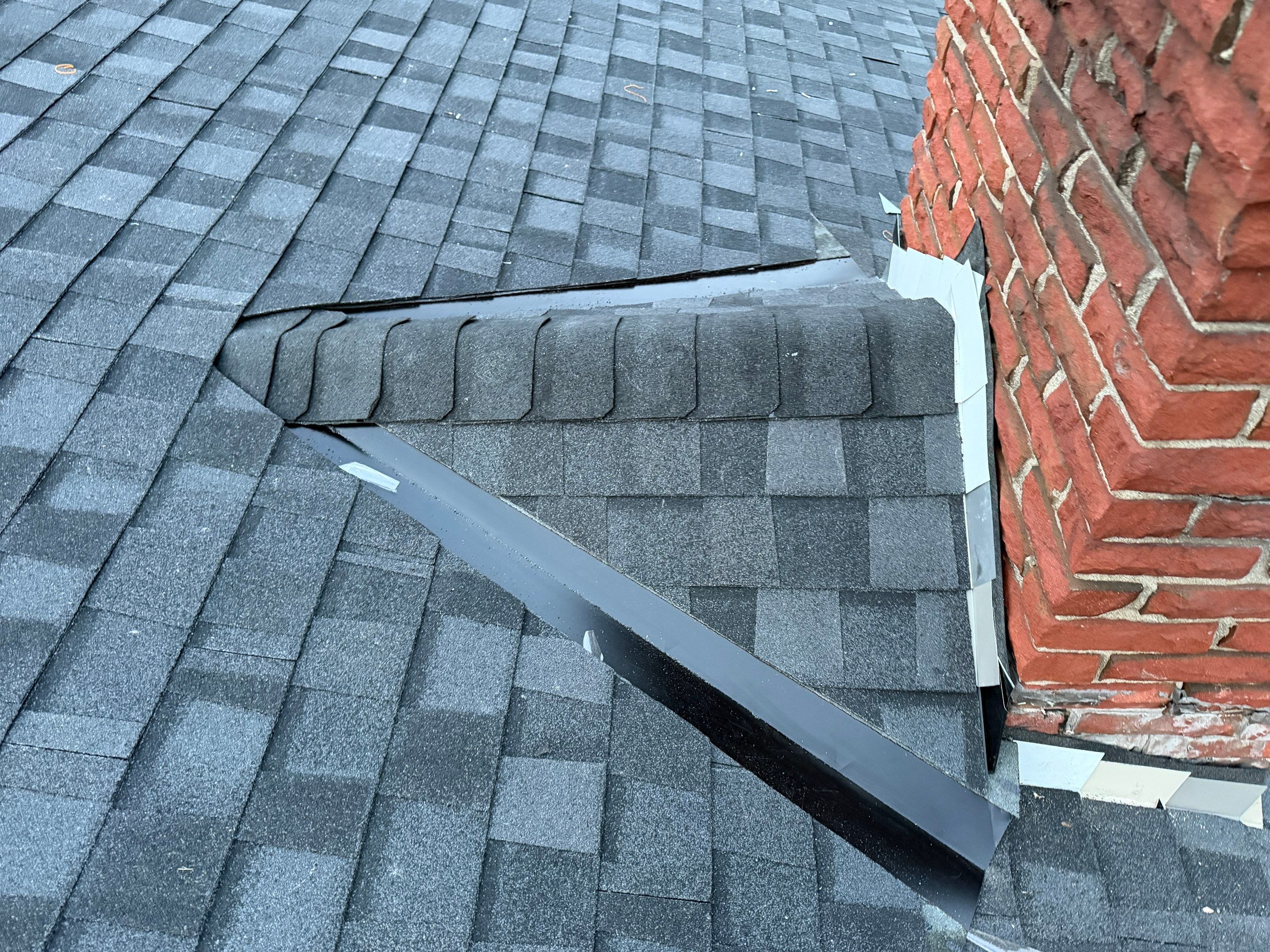 Project in Burlington by The Roofing Crew