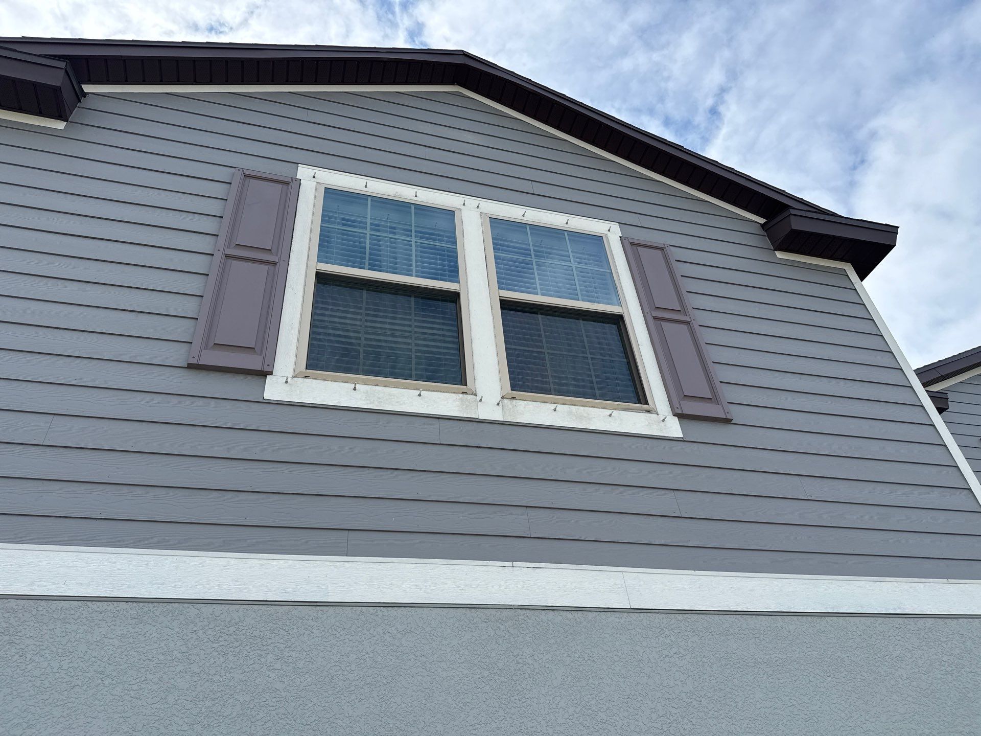 House Wash & Driveway / Sidewalk Cleaning by Sunshine AquaWash