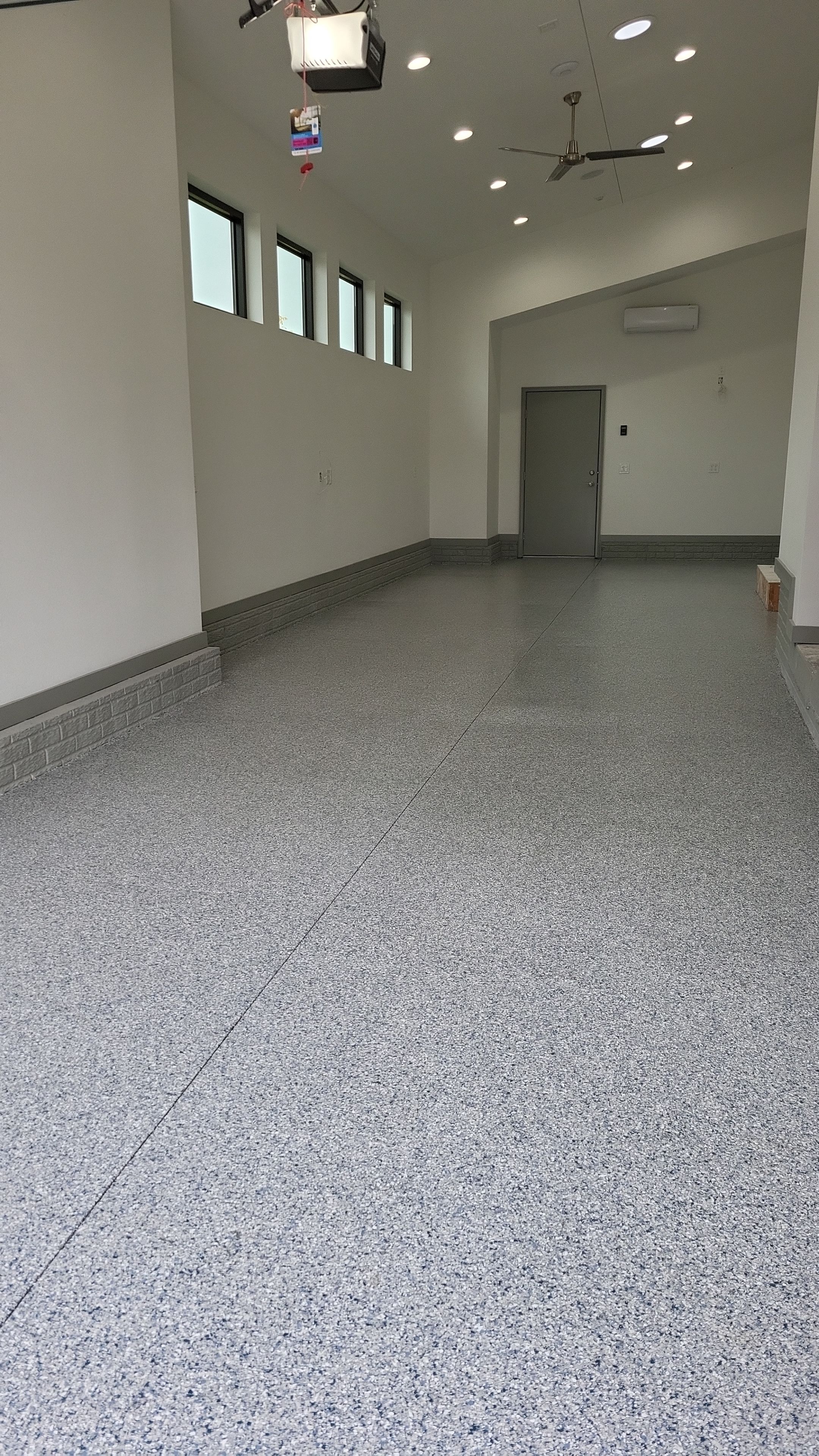 Tidal Wave Garage Floor Coating using Polyaspartic by Revival Concrete Coatings, LLC