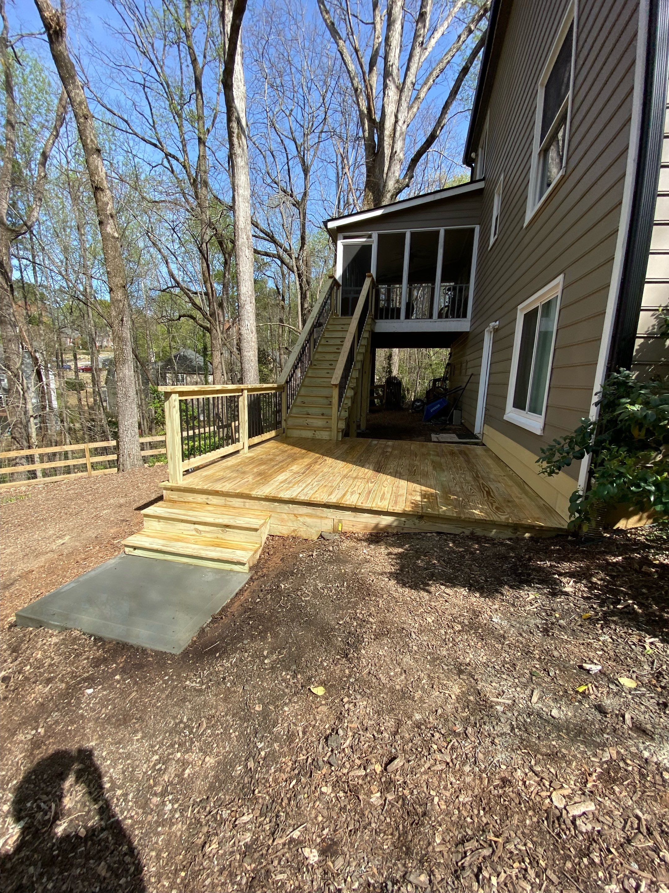 Pressure-Treated Wood Deck and Staircase Installation in Kennesaw by Swift Home Renovations 