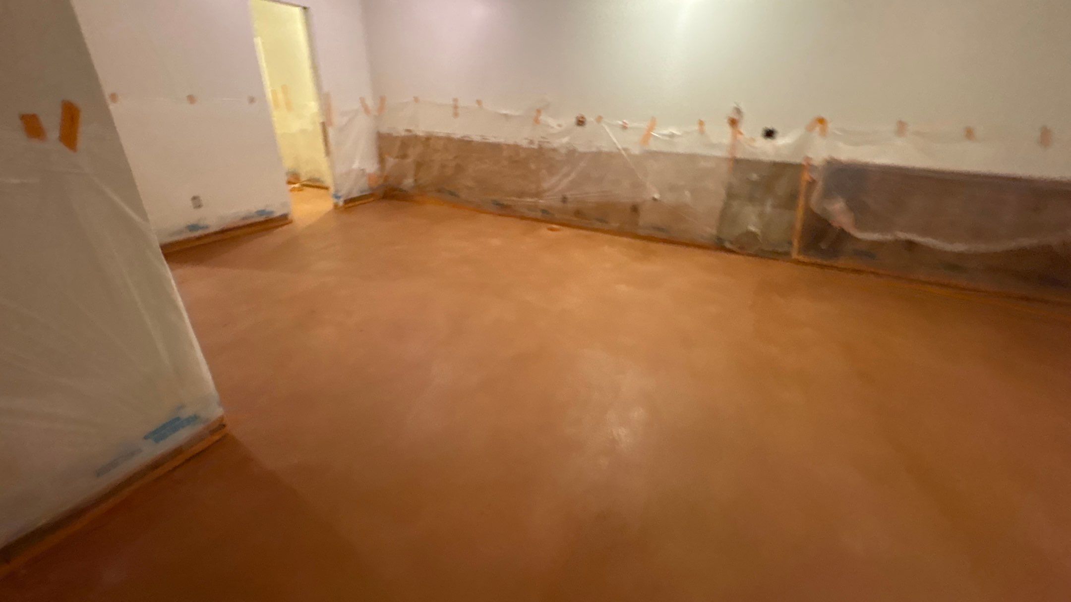 Basement Floor Remodel with Haven Reno KC by Big Red Decorative Concrete, LLC