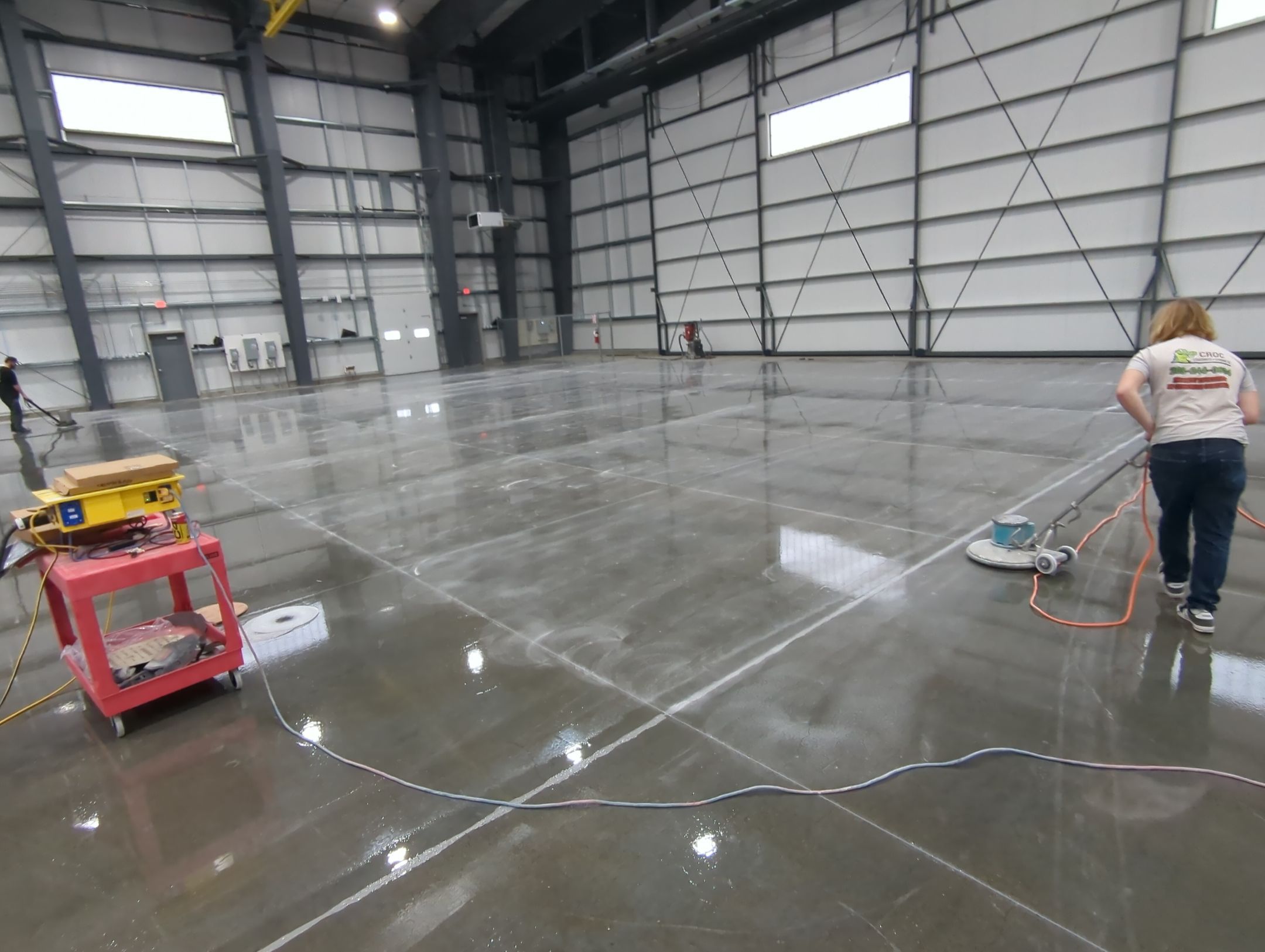 Airplane Hanger using Light Grey Commercial Penntek Epoxy by Croc Coatings, LLC
