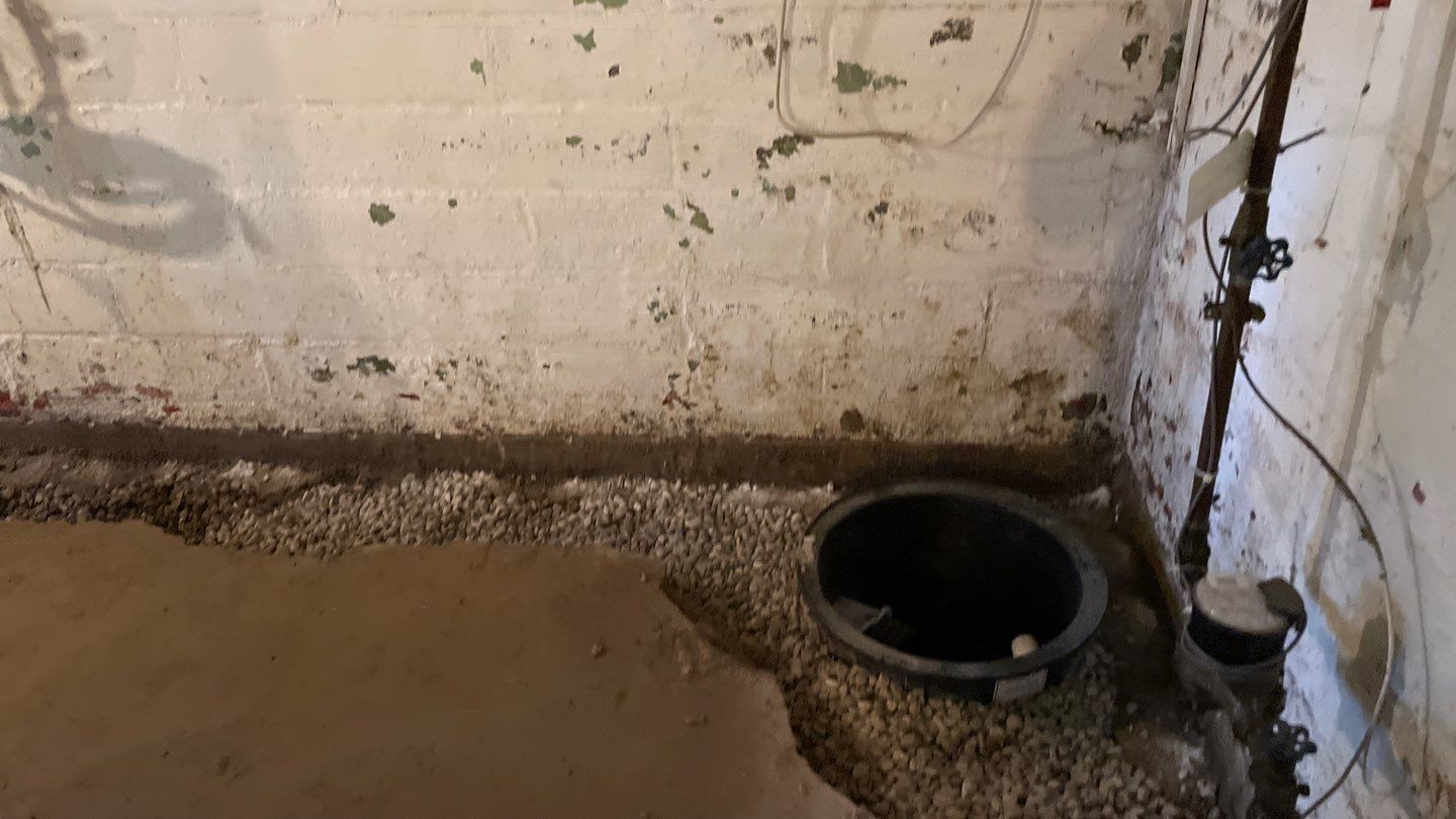 Interior Drain Tile & Sump Pump System in North Minneapolis by Waterproofing Northeast