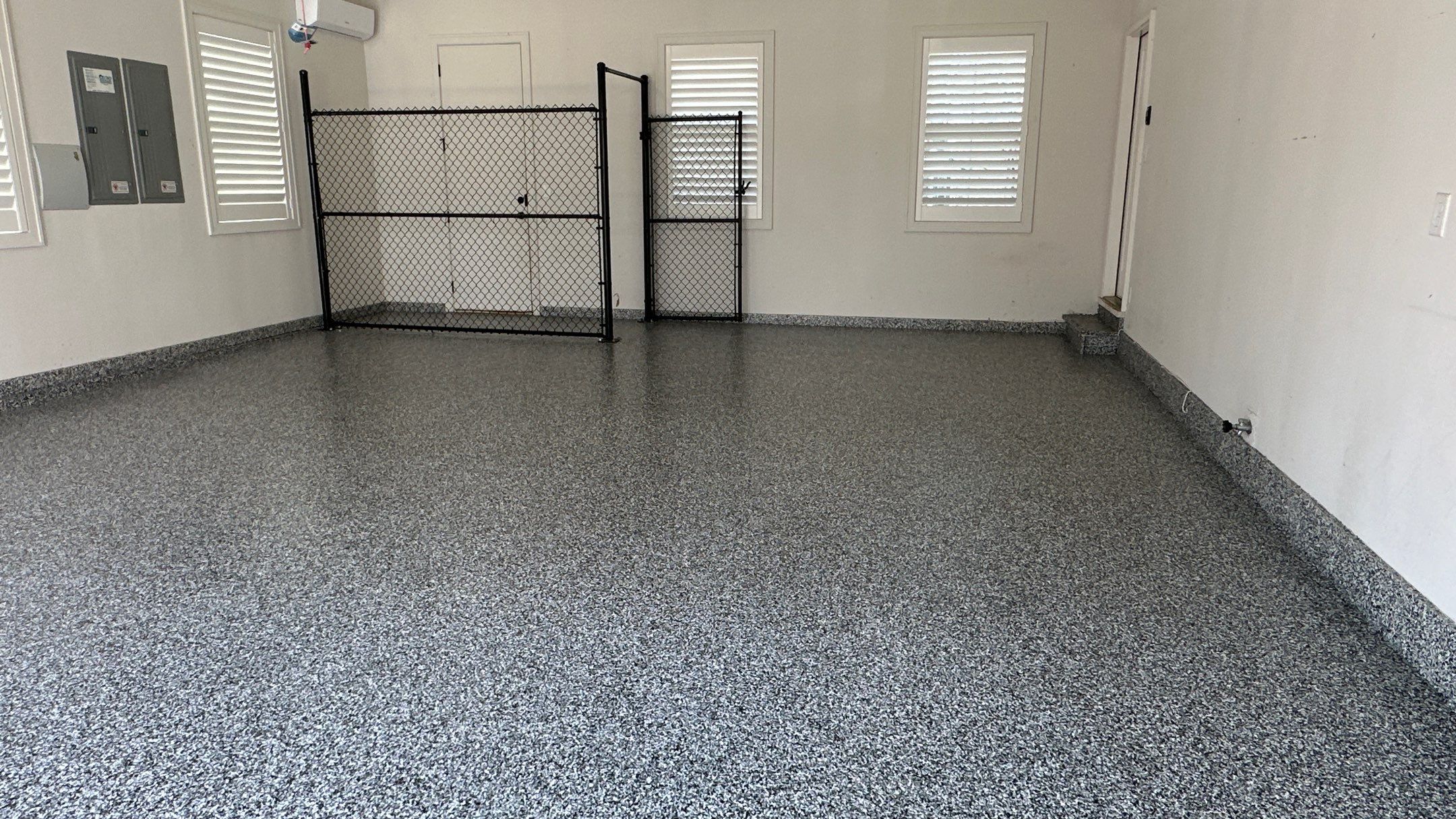 Jim E. went with a beautiful Banner Flake floor  by Banner Garage