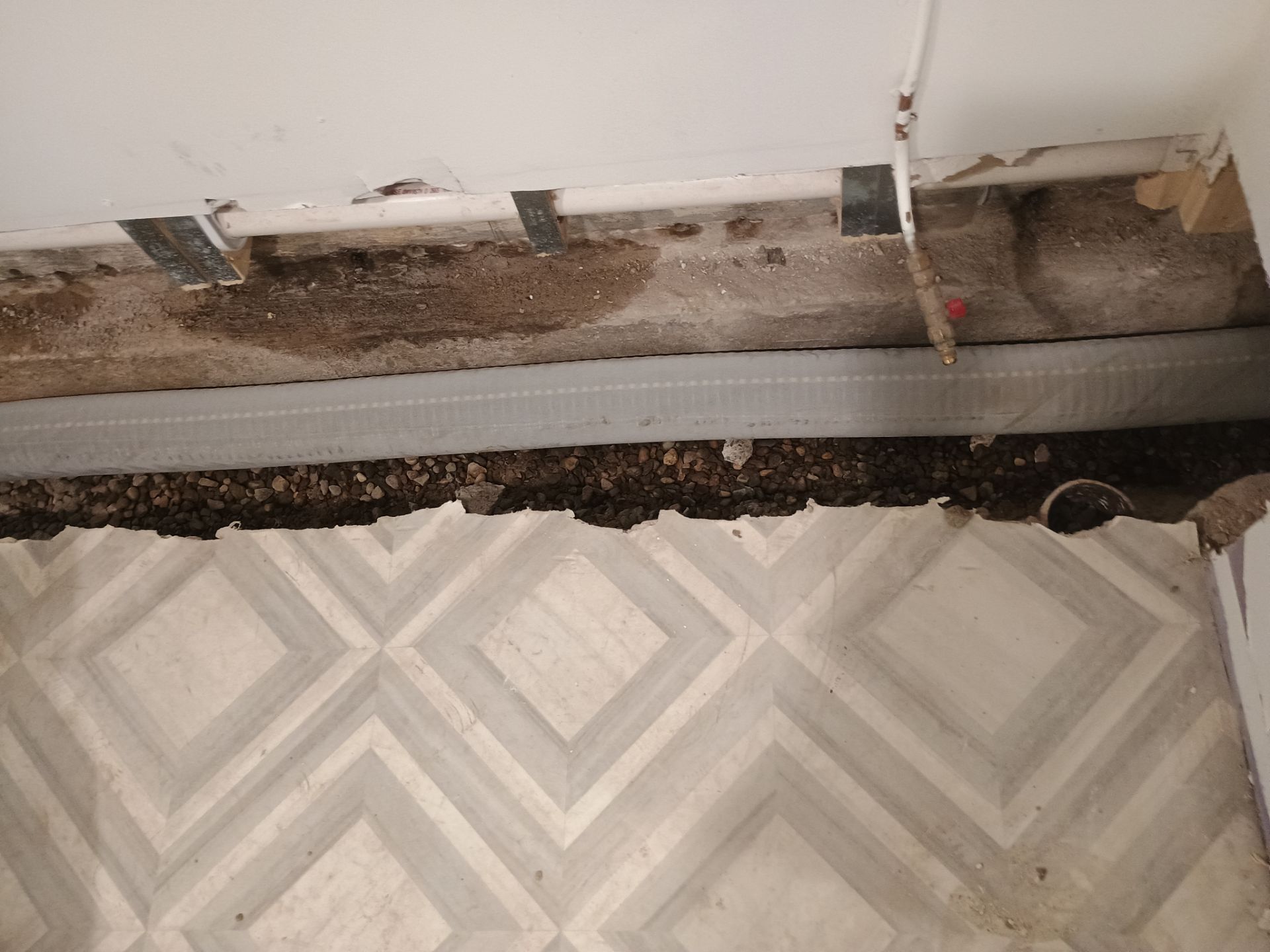 Interior Drain Tile & Buried Discharge in St. Anthony, MN by Waterproofing Northeast