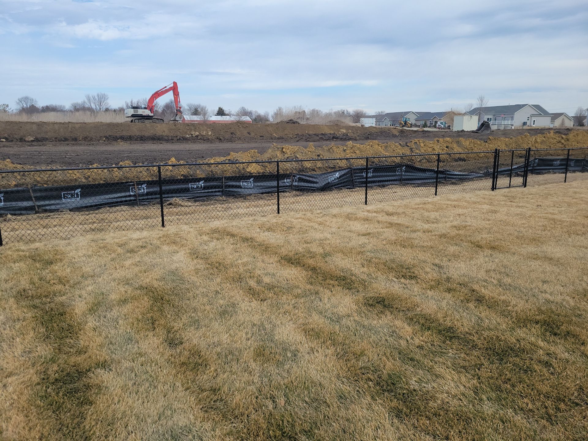 Black Chain Link Fence and Gate Installation in Cedar Falls by Perfect Picket Fence and Stain