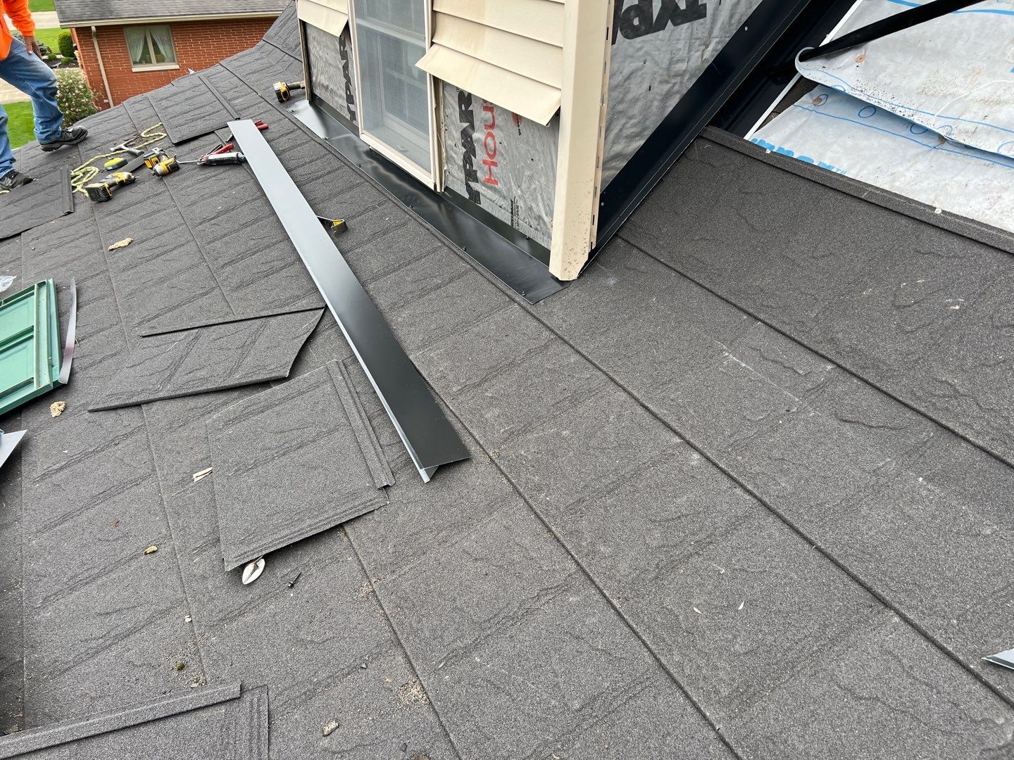Residential Roofing Repair using Metstar Stone Coated Charcoal by Nitro Roofing and Construction