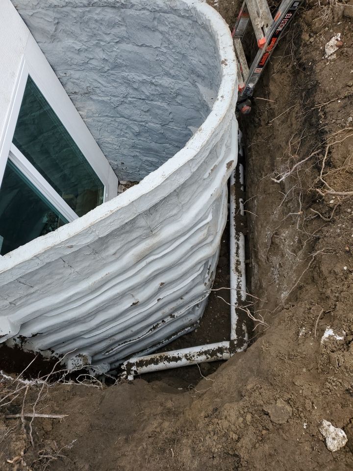 Egress Window Installation using Rockwell Egress Fiberglass Egress Window Well by Toledo Basement Repair 