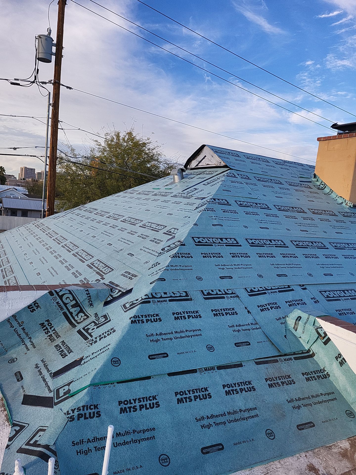 Metallic Silver Exposed Fastener by Reimagine Roofing