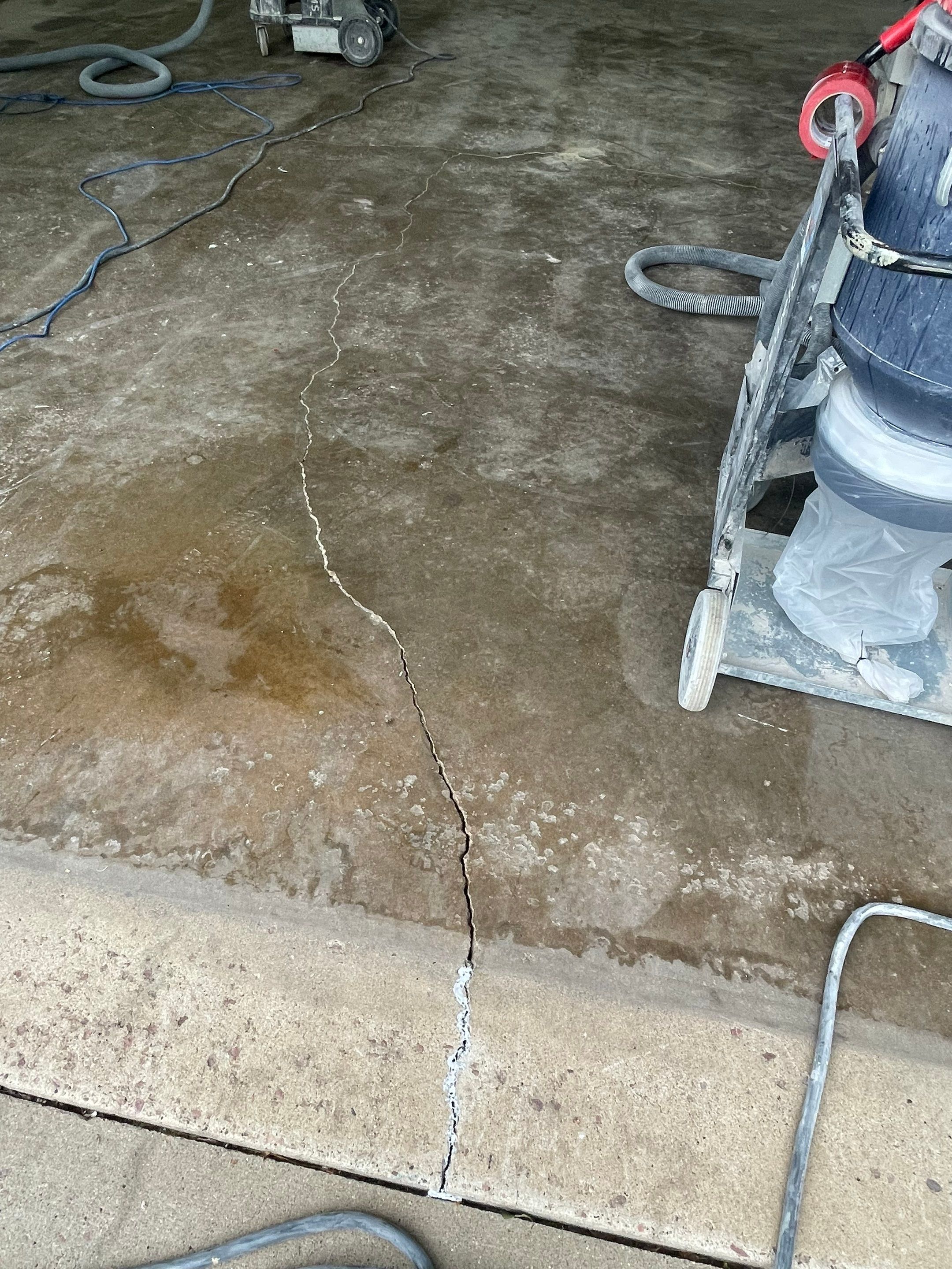 Coyote Flake Concrete Coating for Sioux Falls Garage by Select Painting, Coatings & Garage Cabinets