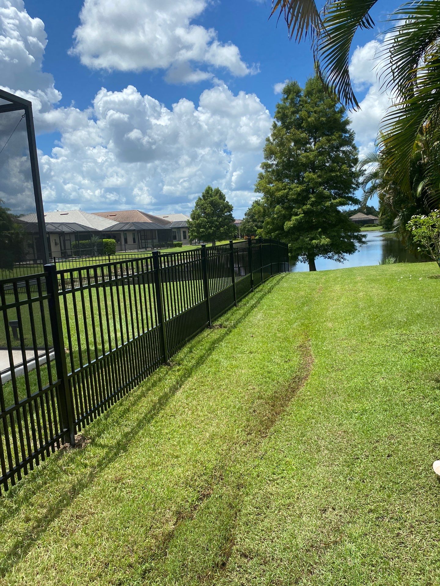 customer with puppy picket aluminum  by H&Y Fence