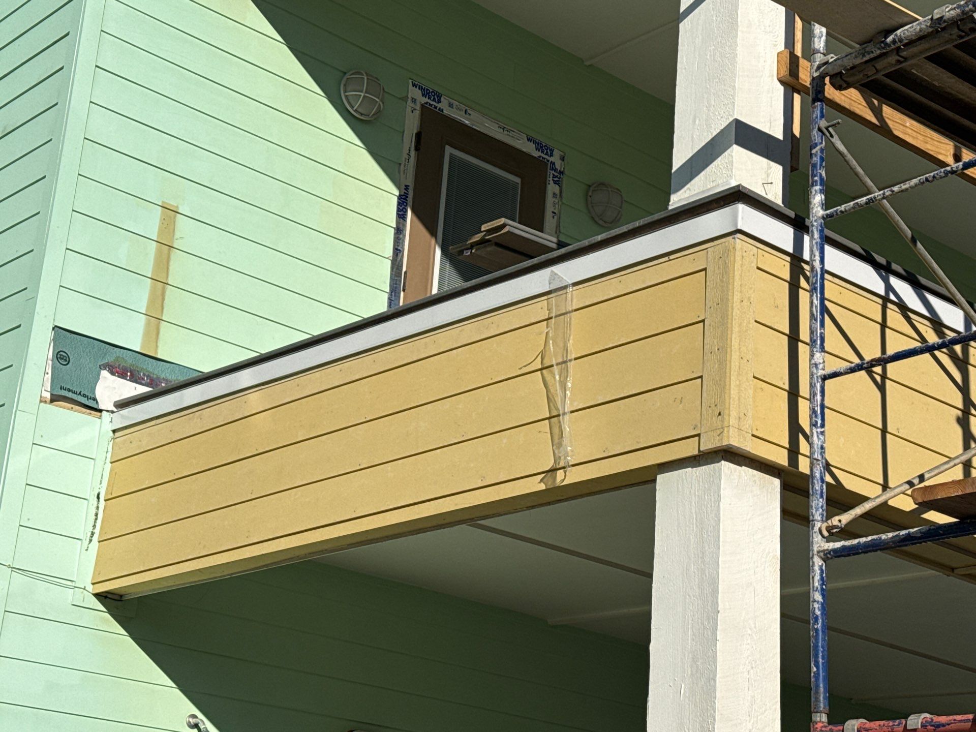 Port A Beach Front Triple Threat by Bayfront Roofing and Construction
