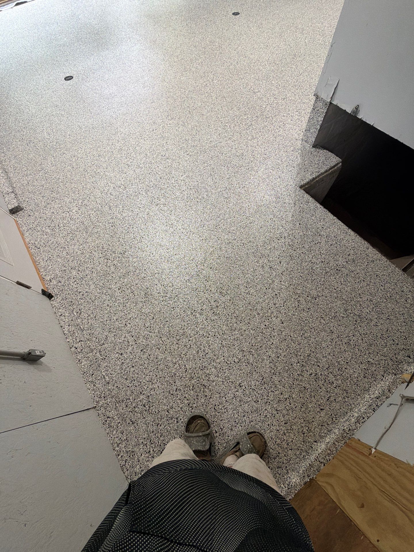 Custom Speckled Epoxy Flake Floor Installation in Grand Haven by Gordon Painting
