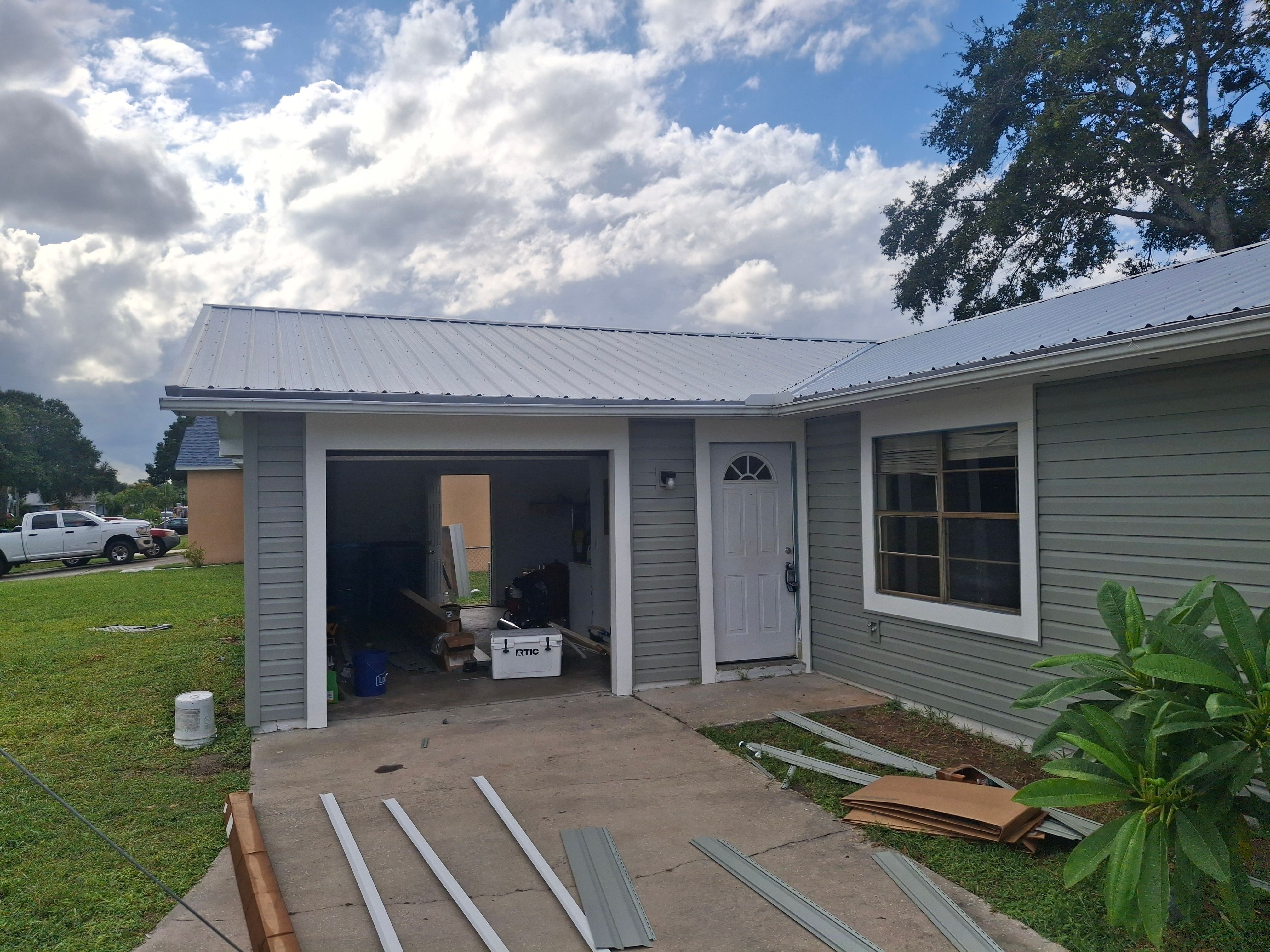 Vinyl Siding Installation and Structural Wood Rot Repair in Palm Bay by Florida Roofing and Renovations Inc.