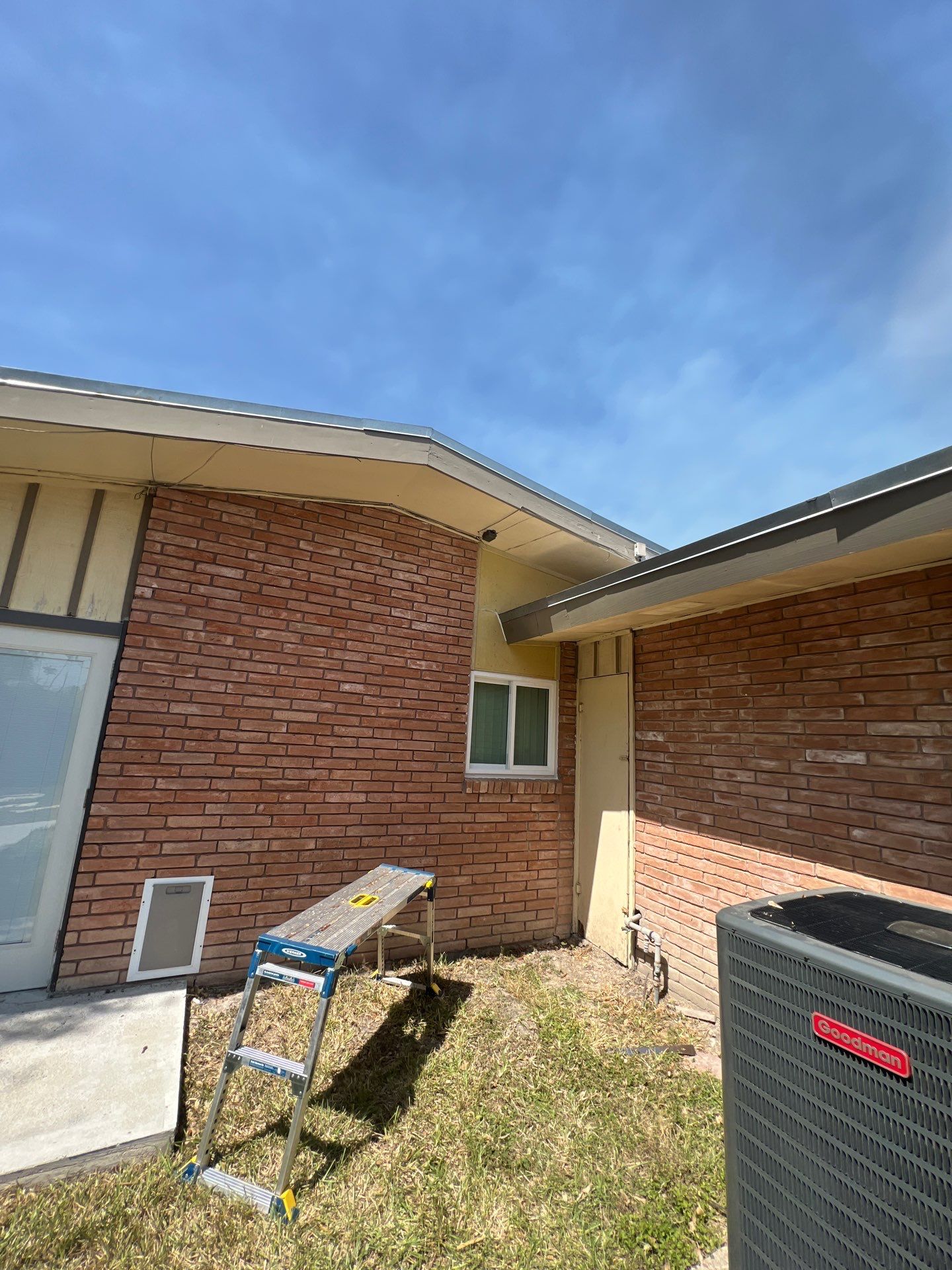 Windows in Brick with a Bay Window by Bayfront Roofing and Construction