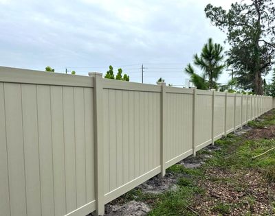Vinyl Fence Installation using Tan Vinyl Privacy Fence