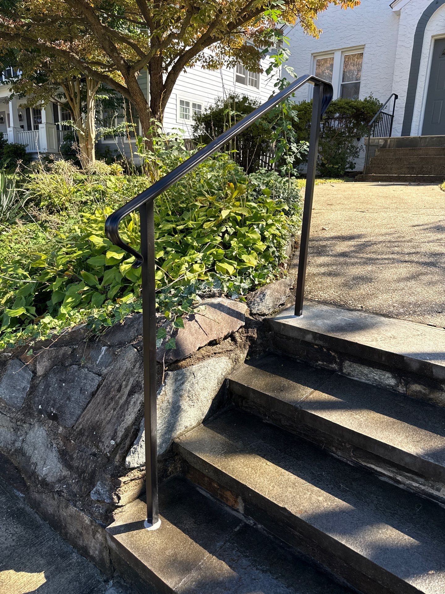 Custom Black Metal Porch and Step Railing Installation in Bethesda by Capitol Iron Works