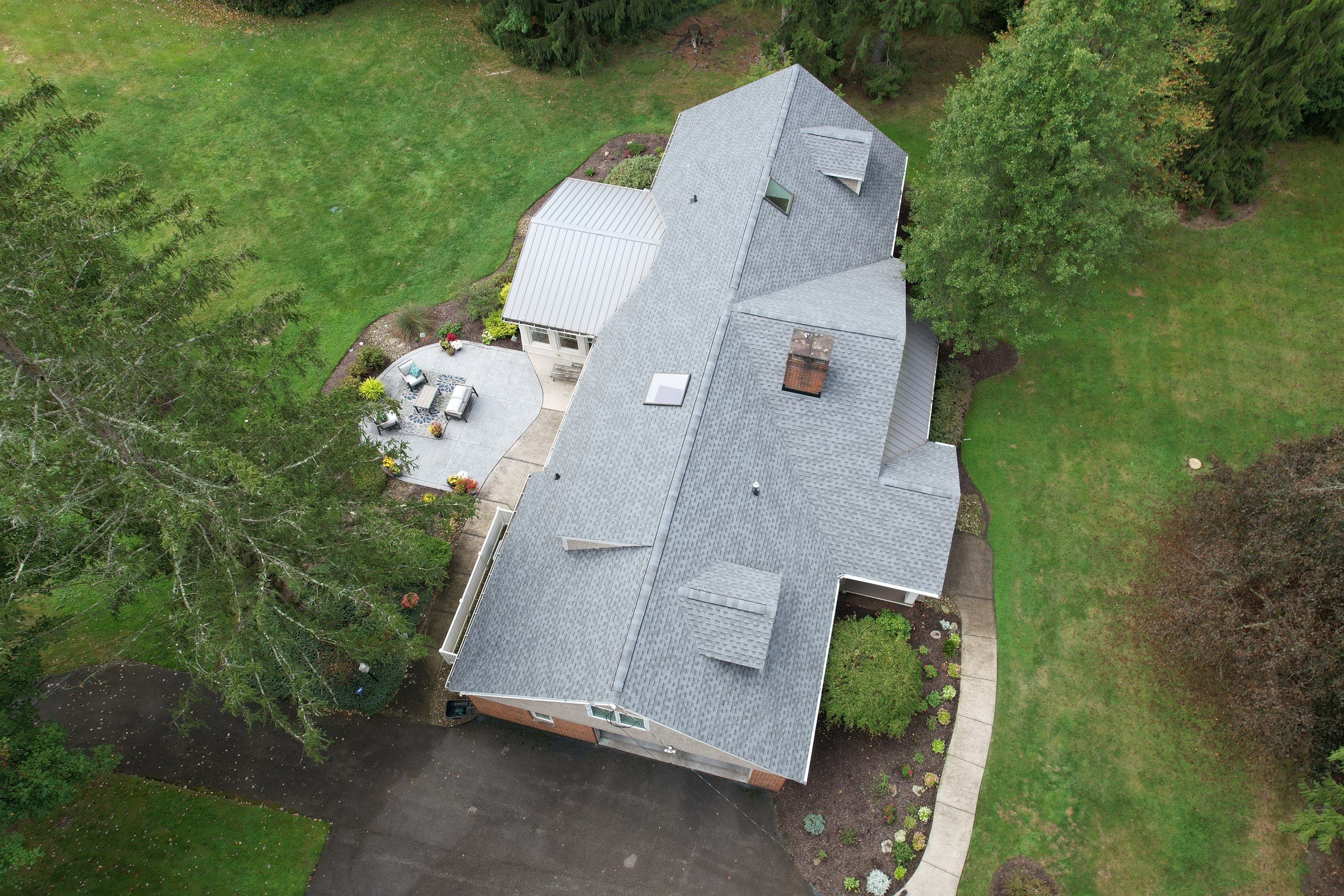 Moreland Hills Roof + Gutters Replacement by Atlas Roofing & Restoration