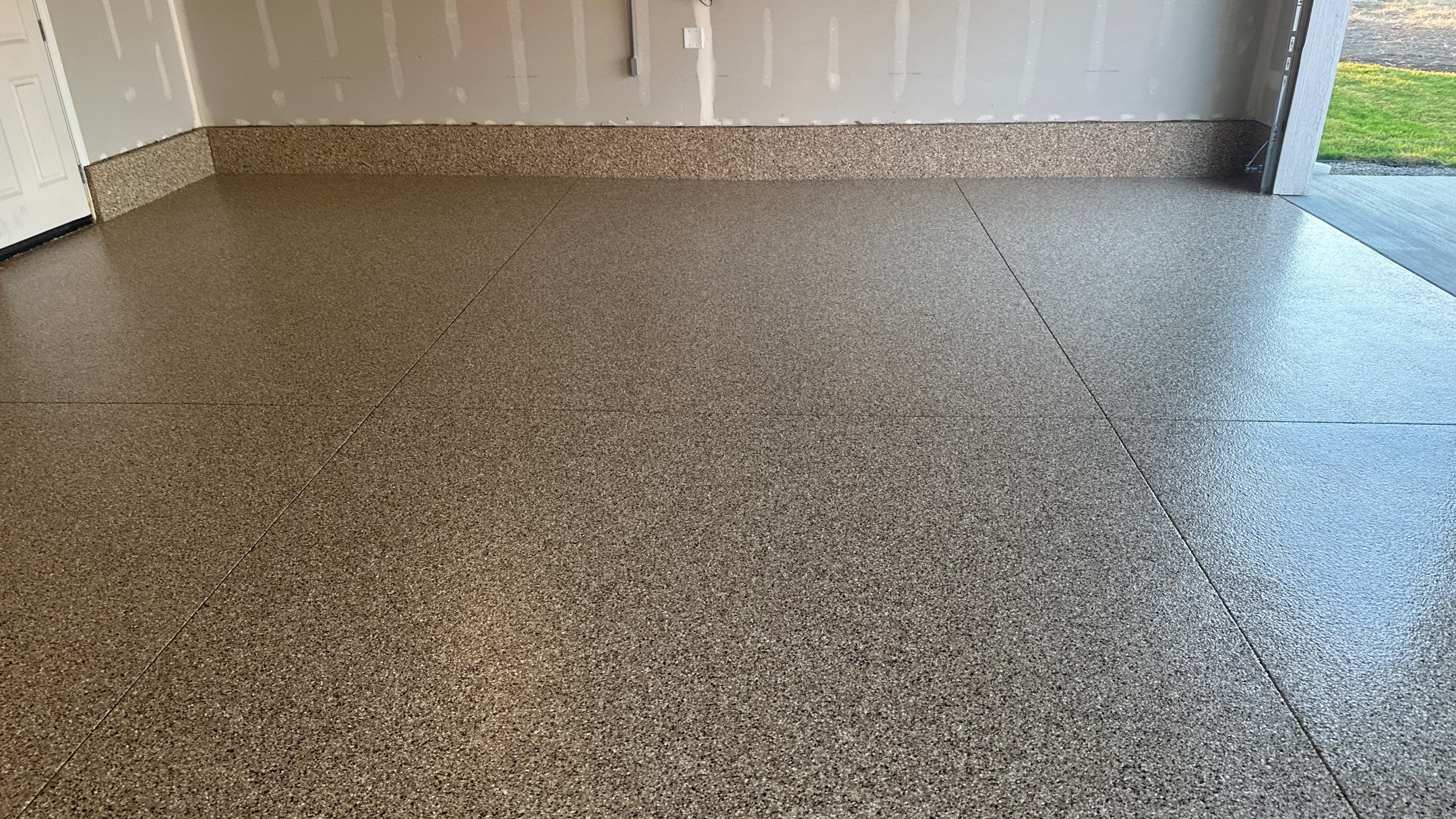 Garage Transformation using Sandstone by Croc Coatings, LLC