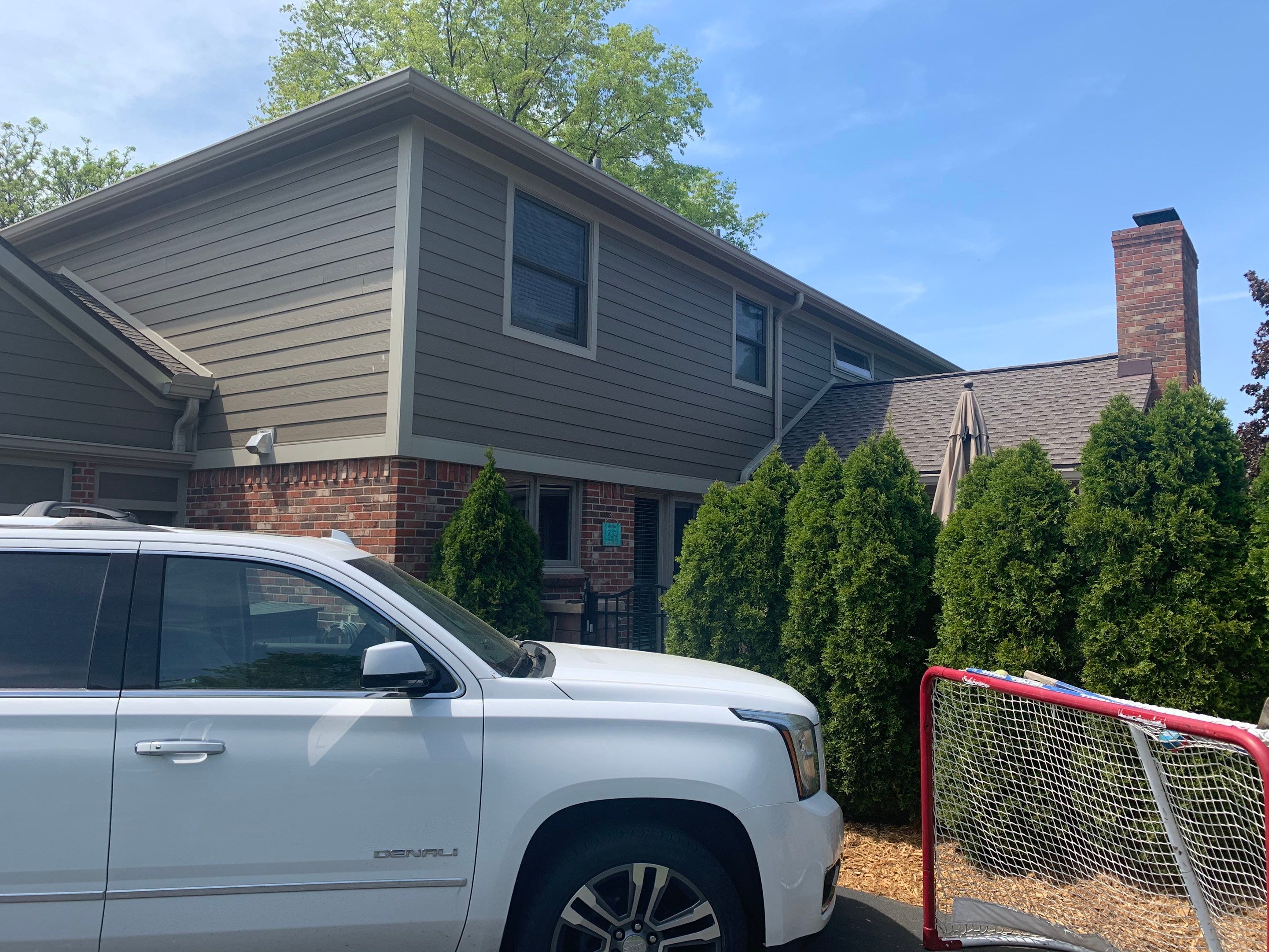 James Hardie Siding Replacement & Porch Addition by Bloomfield Construction & Restoration